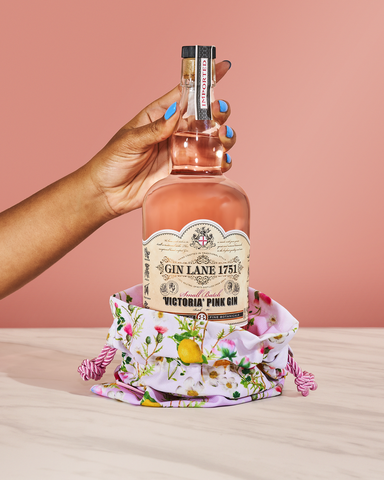 Designer Cynthia Rowley and Gin Lane 1751 collaborated on this ode to Victorian pink gin, which comes in a versatile clutch. Courtesy of Gin Lane 1751