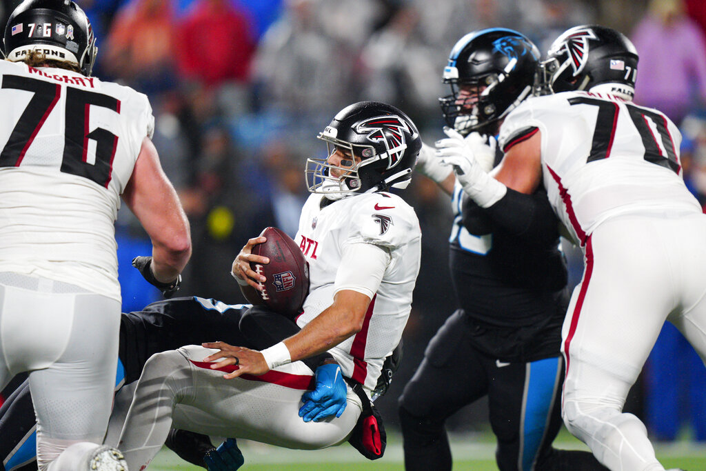 Atlanta Falcons punter Bradley Pinion (13) punts during the first