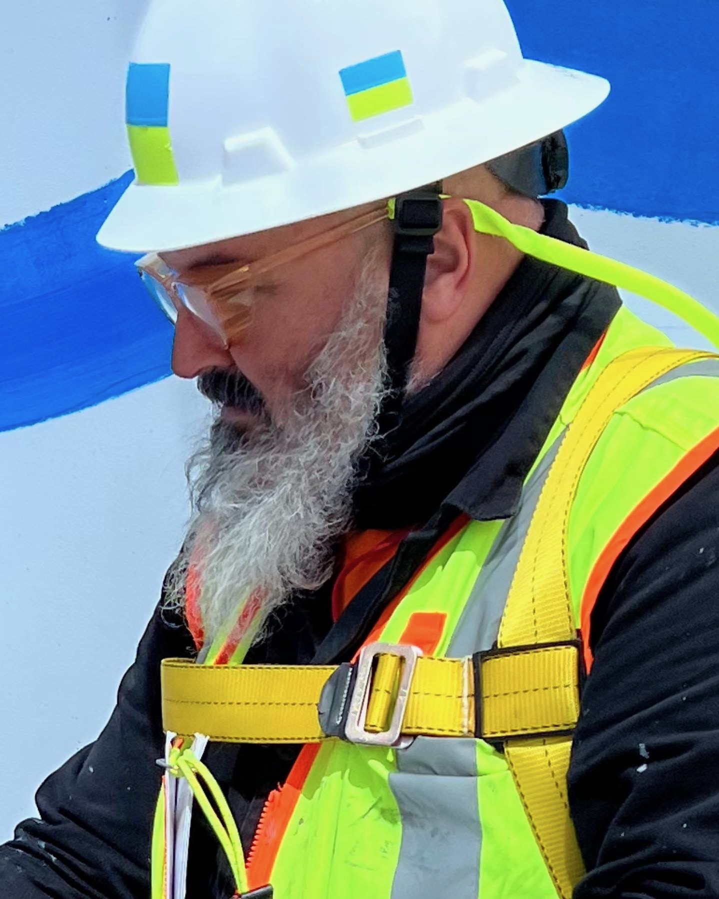 Joe Dreher and his team are creating a mural at the Midtown Union building.