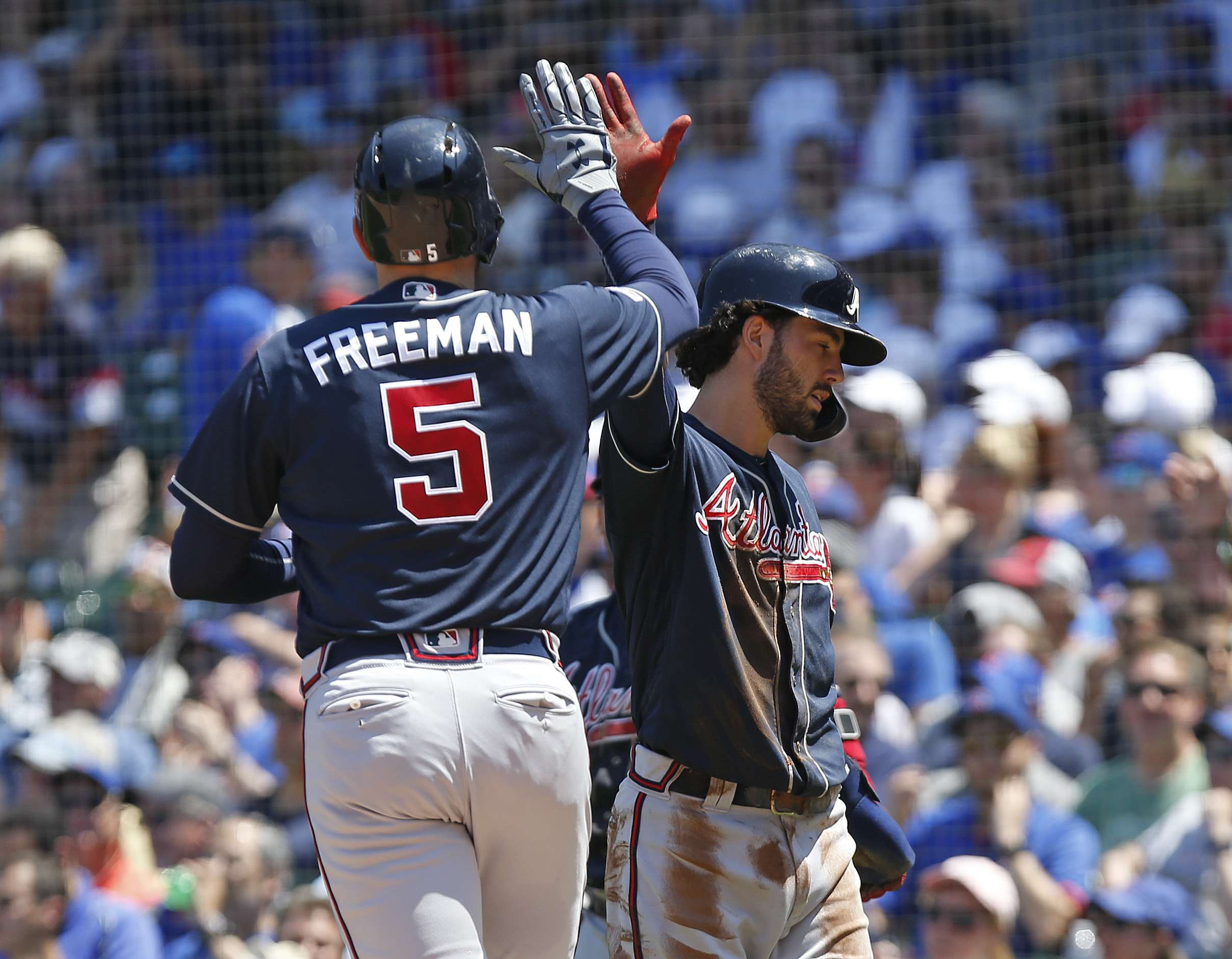 Craig Kimbrel closes out debut with Rizzo's help as Cubs beat Braves, 9-7