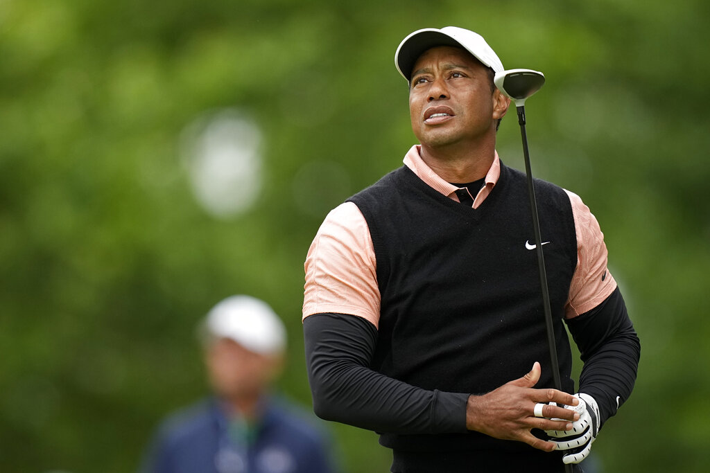 Tiger Woods watches his tee shot on the 17th hole during the third round of the PGA Championship golf tournament at Southern Hills Country Club, Saturday, May 21, 2022, in Tulsa, Okla. (AP Photo/Eric Gay)