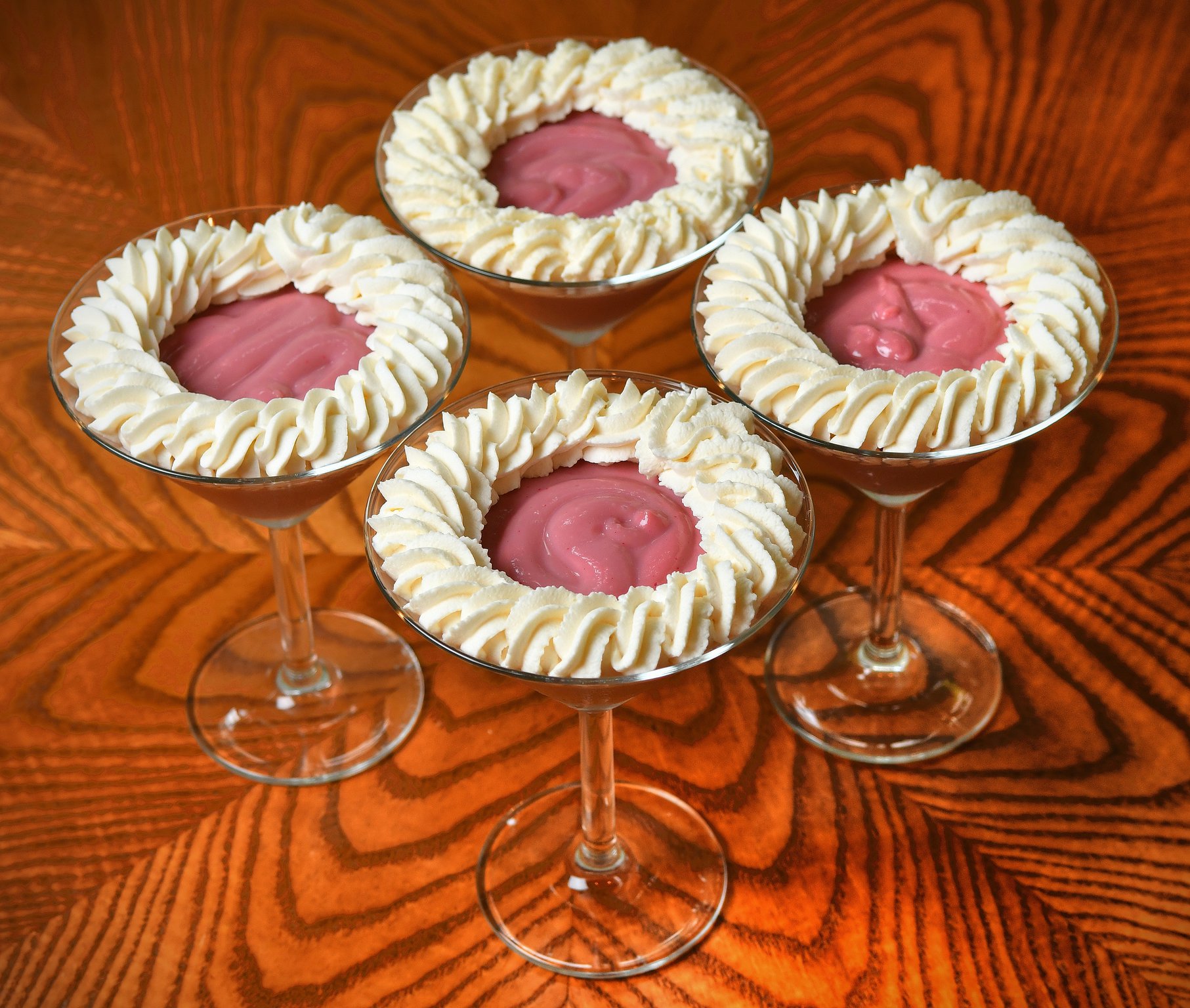 Cosmopolitan Cream Pies, Served Up don’t need a crust because they’re served in martini glasses. STYLING BY PAUL ARGUIN AND CHRIS TAYLOR / CONTRIBUTED BY CHRIS HUNT PHOTOGRAPHY