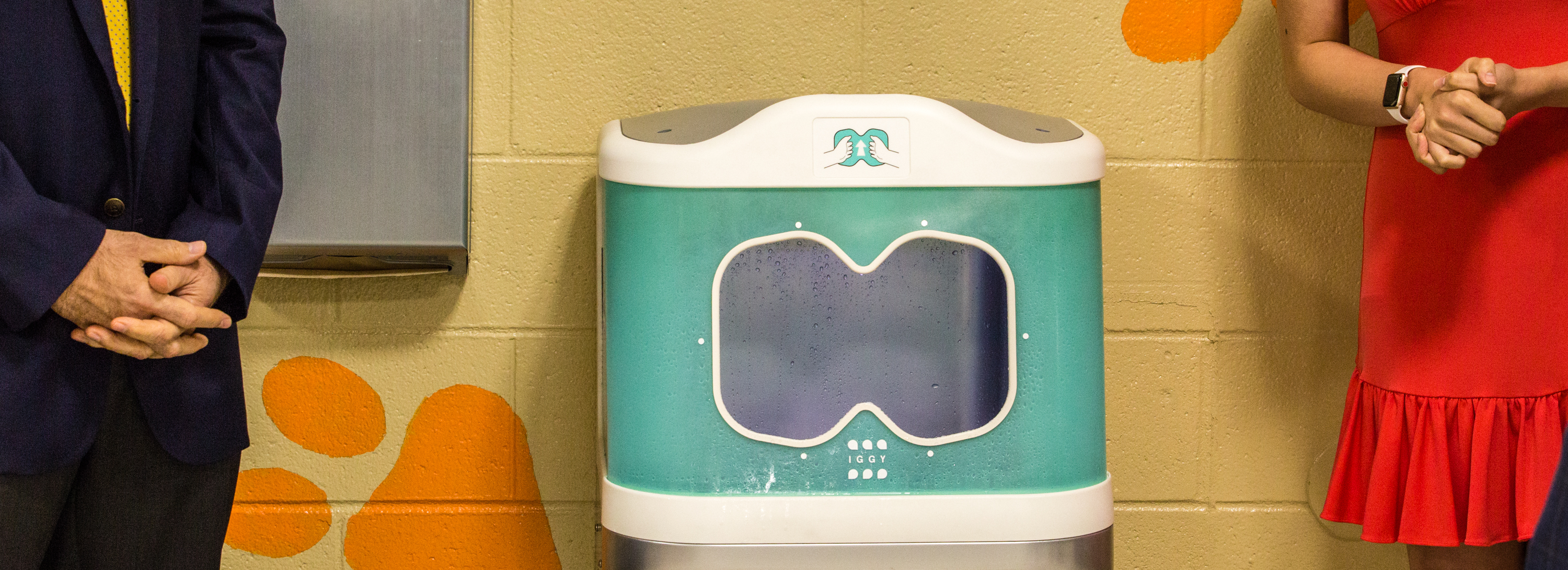 "Iggy", 30e Scientific's first aqueous ozone hand washing station is installed in the Bryant Elementary School cafeteria in Mableton. The sanitation station uses ozone, a natural disinfectant, to clean elementary school hands in seven seconds before students pick up their school lunches. The Cobb County School District and the makers of the three sanitation systems installed at the school share information before moving into demonstrates of the technologies Wednesday, Oct 21, 2020. (Jenni Girtman for The Atlanta Journal-Constitution)
