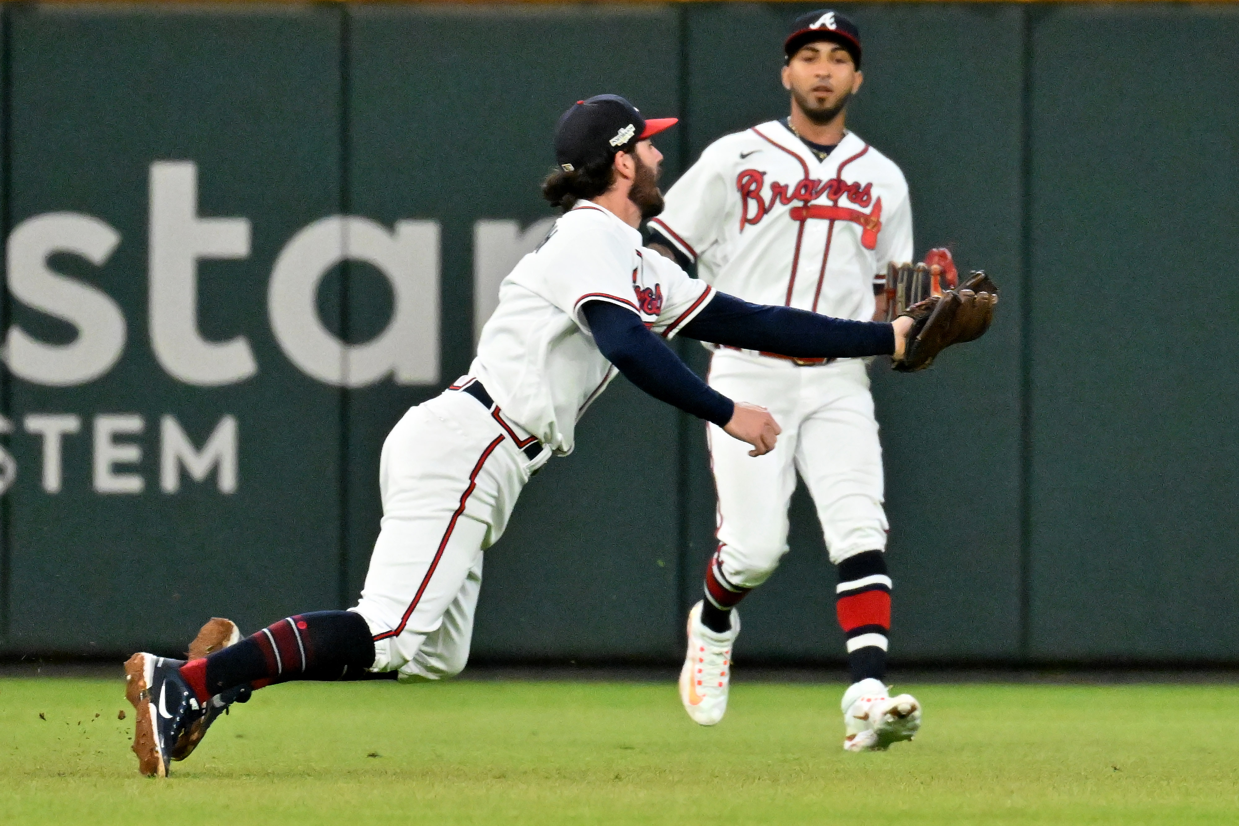 Dansby Swanson of the Atlanta Braves in action against the New
