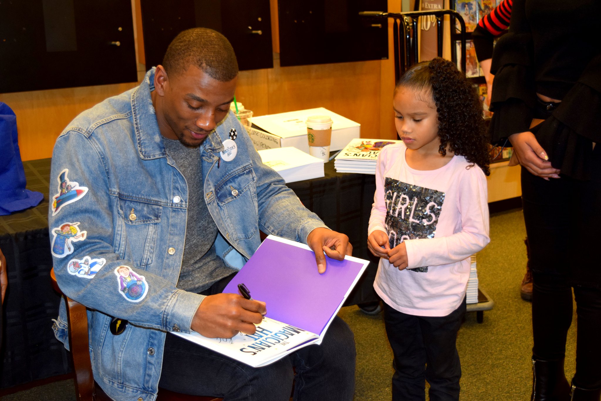 Malcolm Mitchell promotes the importance of reading