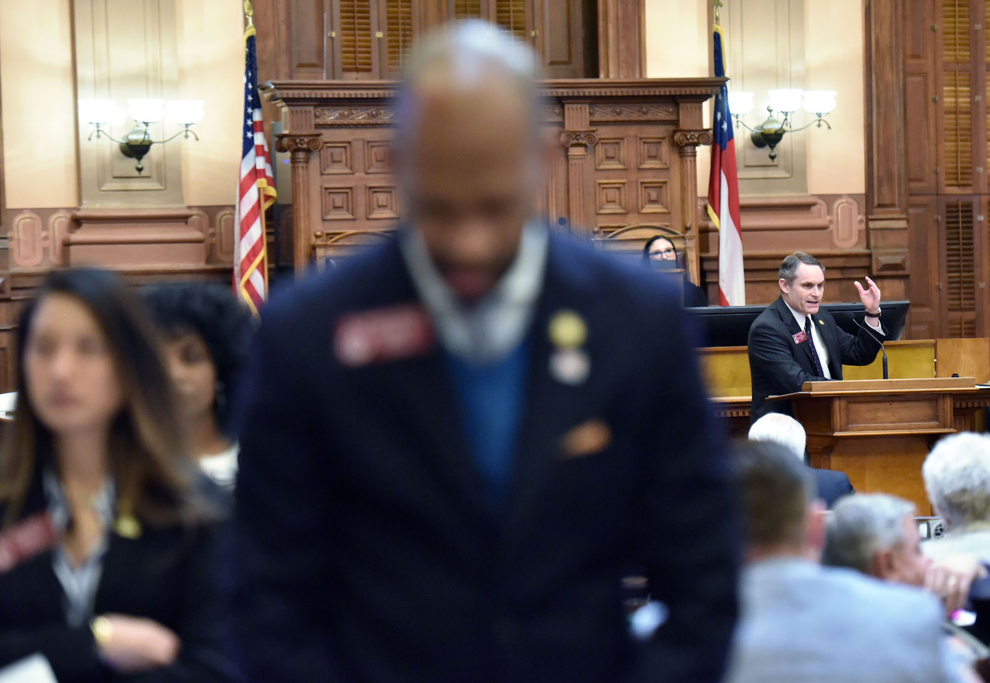 March 7, 2019 Atlanta - Democrats turn their backs on state Rep. Ed Setzler (right), an Acworth Republican, speaks to support his bill HB 481, which would outlaw abortions once a doctor can detect a heartbeat in the womb, in the House Chambers during Crossover day at the Capitol on Thursday, March 7, 2019. Hundreds of bills hang in the balance at the Georgia Capitol on Thursday, the self-imposed deadline for legislation to pass at least one chamber. Dozens of bills ranging from the hotly contested to the mundane will be debated on Crossover Day, which occurs on the 28th business day of each yearâs 40-day legislative session. HYOSUB SHIN / HSHIN@AJC.COM