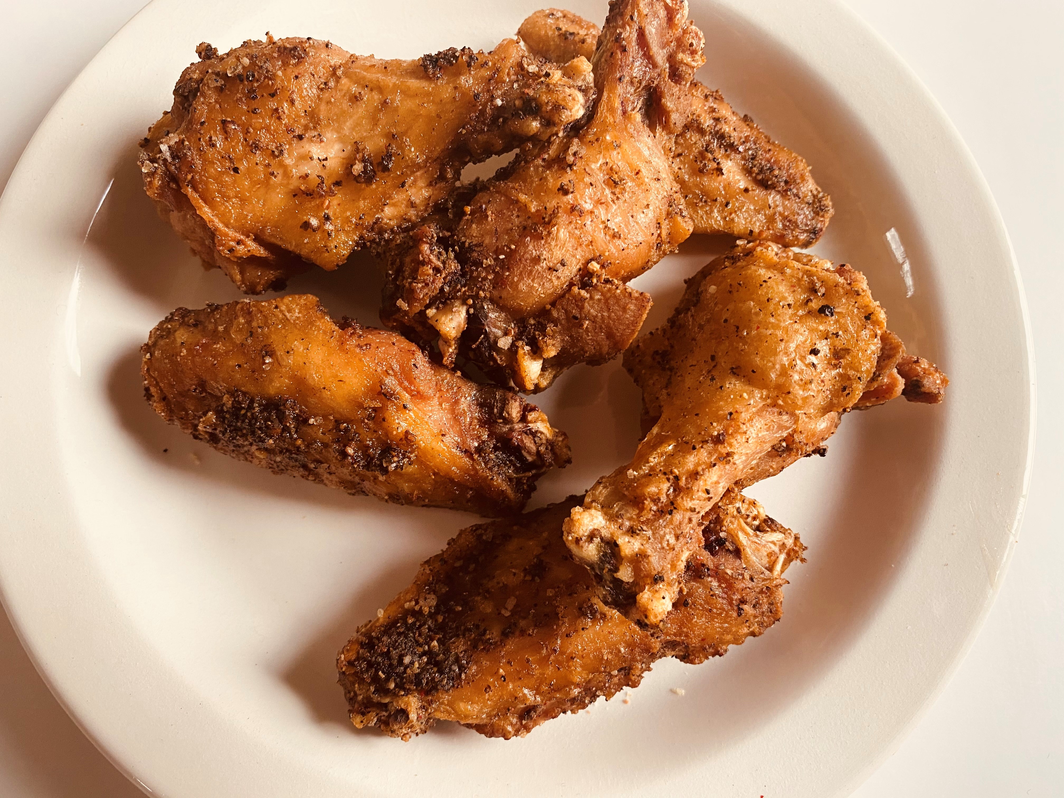 Chicken Out's crispy chicken wings are brined, smoked and then fried to order, with a choice of rub or sauce. Bob Townsend for The Atlanta Journal-Constitution