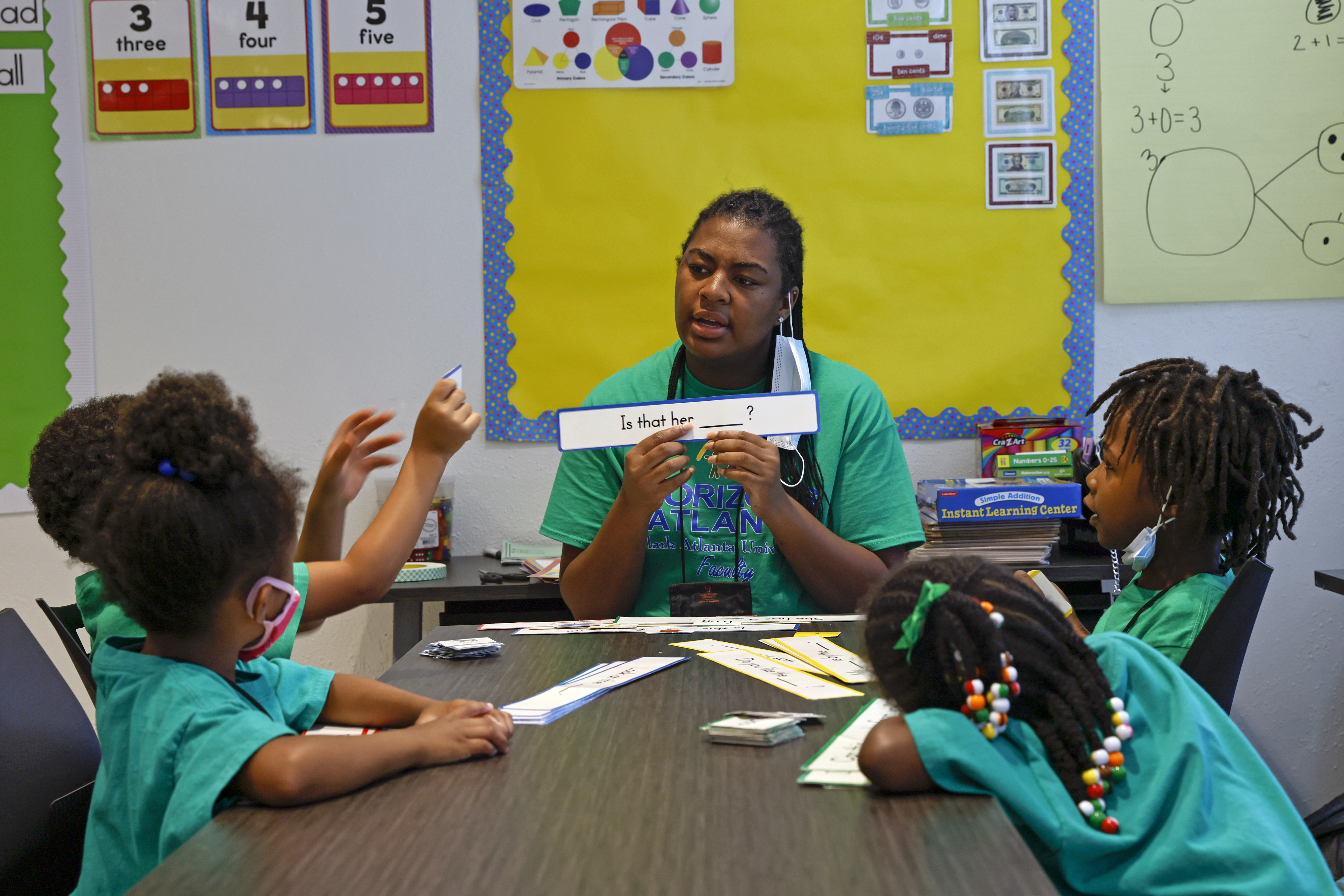 Jayla Atkins, a Clark Atlanta University senior, works with a group of first graders in the Horizons Atlanta summer program on Thursday, June 9, 2022. Clark Atlanta educators are participating in a five-day conference organized by the United Negro College Fund that aims to help historically Black colleges and universities improve academic services in areas like online education, technology and student performance. (Natrice Miller / natrice.miller@ajc.com)
