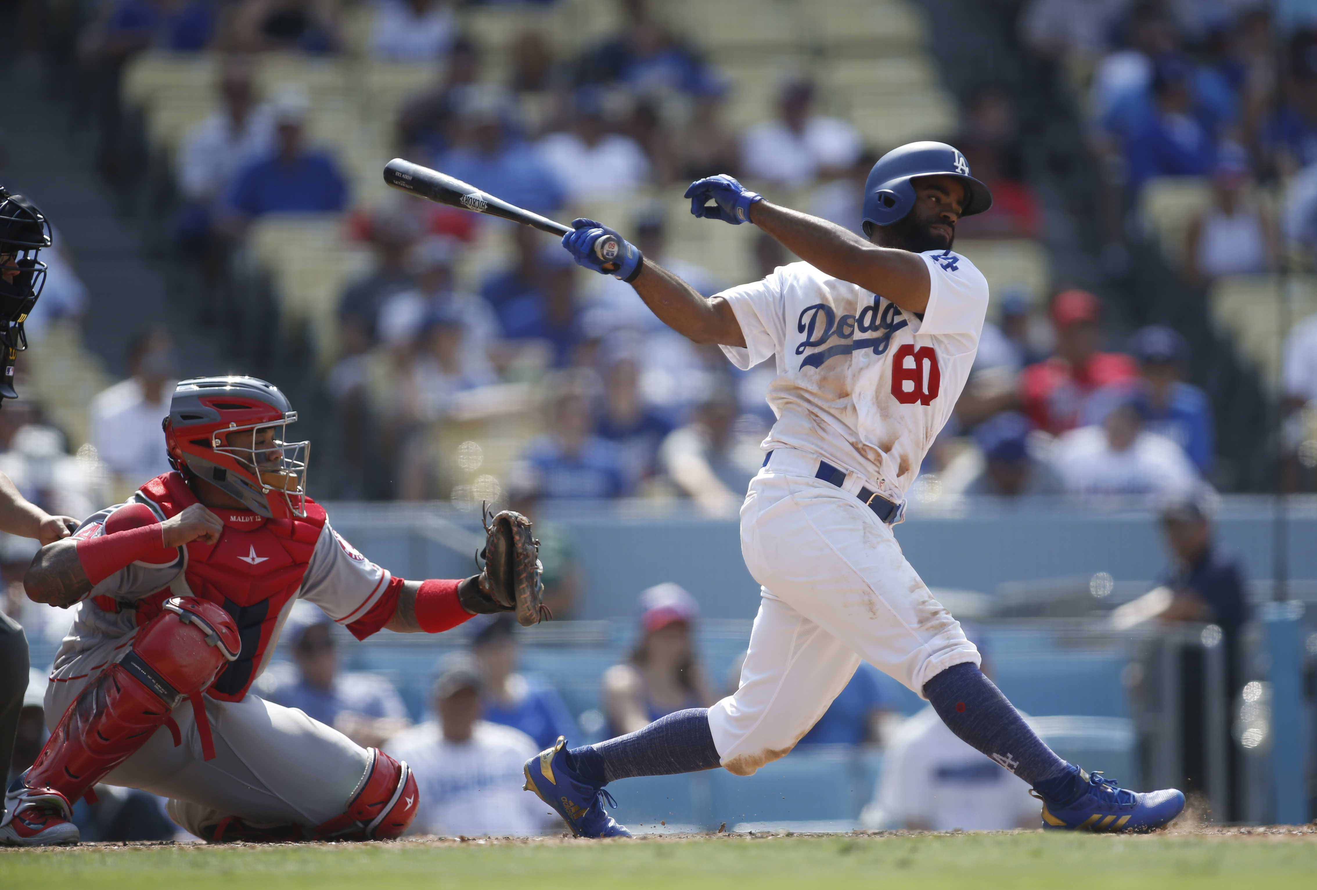 Dodgers' Andrew Toles arrested after sleeping behind Florida airport