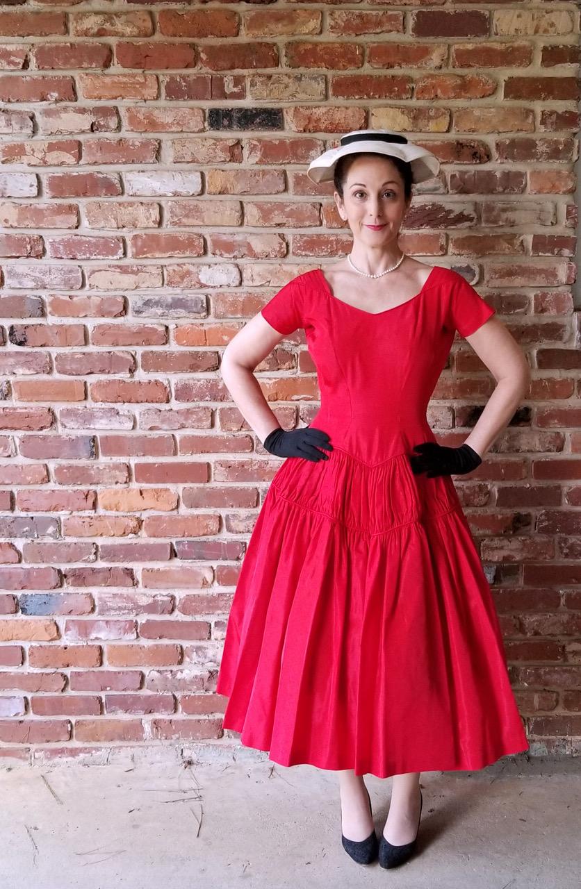 Liza Dolensky of Better Dresses Vintage is a proper '50’s lady with her hat, gloves and pearls.
(Courtesy of Liza Dolensky)