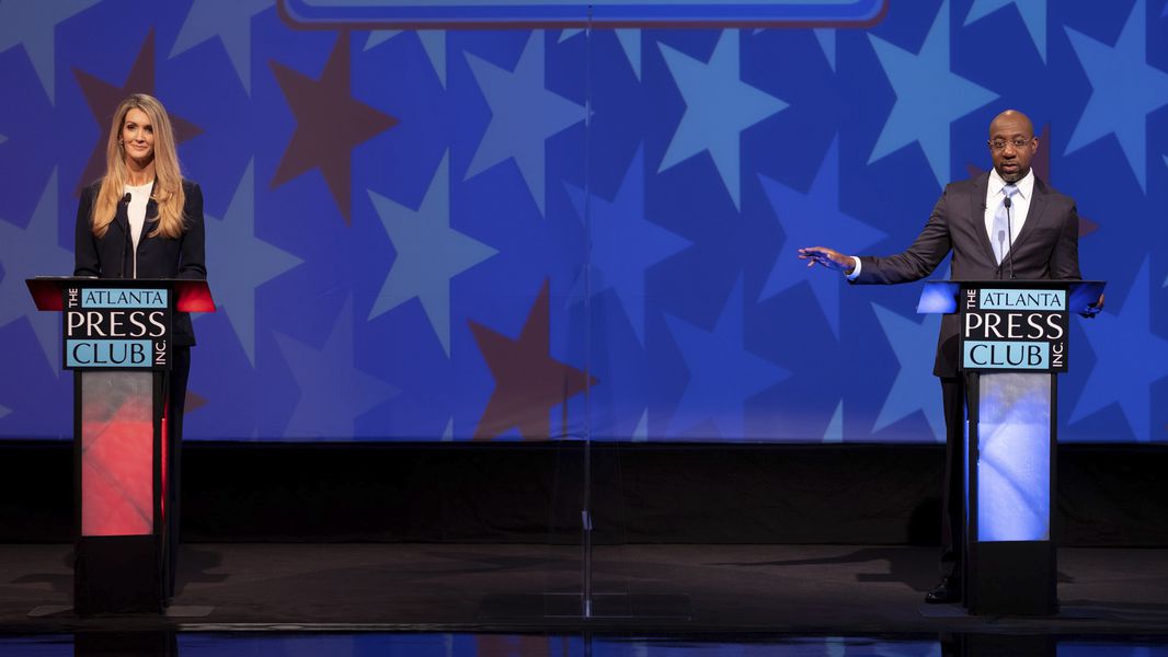 Sen. Kelly Loeffler and Rev. Raphael Warnock faced off in heated debate on Dec. 6, 2020. Angelo Carusone, president of Media Matters of America, a left-leaning watchdog organization, expects that the Loeffler campaign will continue to bring up Warnock's 2002 arrest because it appeals to QAnon conspiracy theorists.