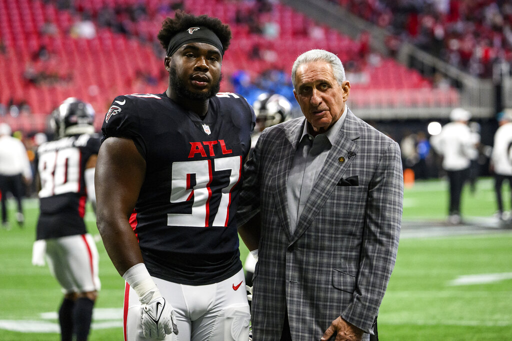 Atlanta Falcons owner Arthur Blank models a new Falcons' jersey during a  press conference and fashion show at the Mall of Georgia in Buford, Ga.,  Thursday, April 24, 2003. The Falcons unveiled