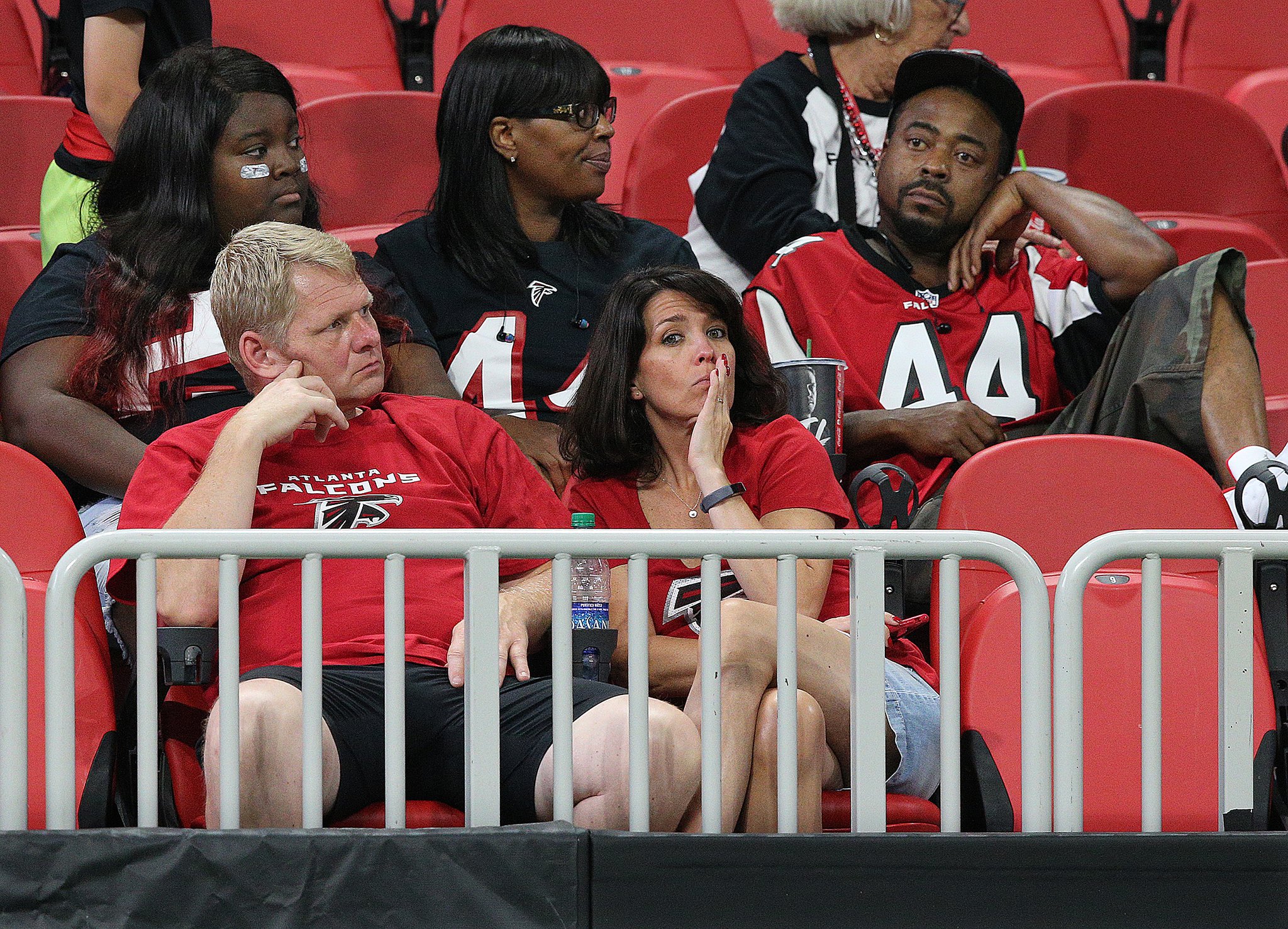 New Orleans Saints vs. Atlanta Falcons. Fans support on NFL Game.  Silhouette of supporters, big screen with two rivals in background Stock  Photo - Alamy