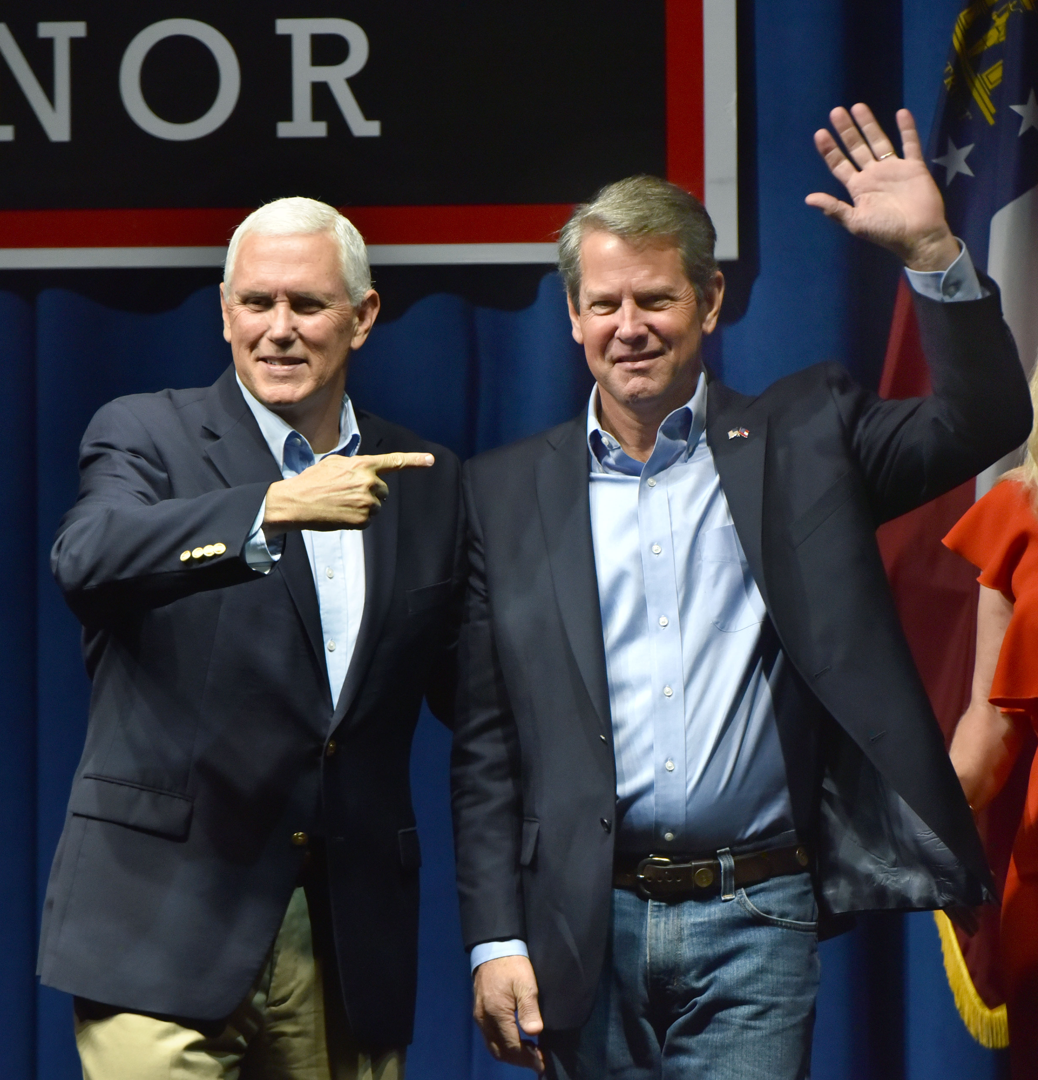 November 1, 2018 Dalton - Vice President Mike Pence and GOP gubernatorial candidate Brian Kemp wave to supporters at Dalton Convention Center in Dalton on Thursday, November 1, 2018. The nationally-watched Georgia race for governor is about to get even more attention. Vice President Mike Pence is headed to Georgia on Thursday for a trio of events in conservative areas for Brian Kemp. Democrats are countering with a visit by Oprah Winfrey, who will appear with Stacey Abrams at a pair of town hall meetings. HYOSUB SHIN / HSHIN@AJC.COM