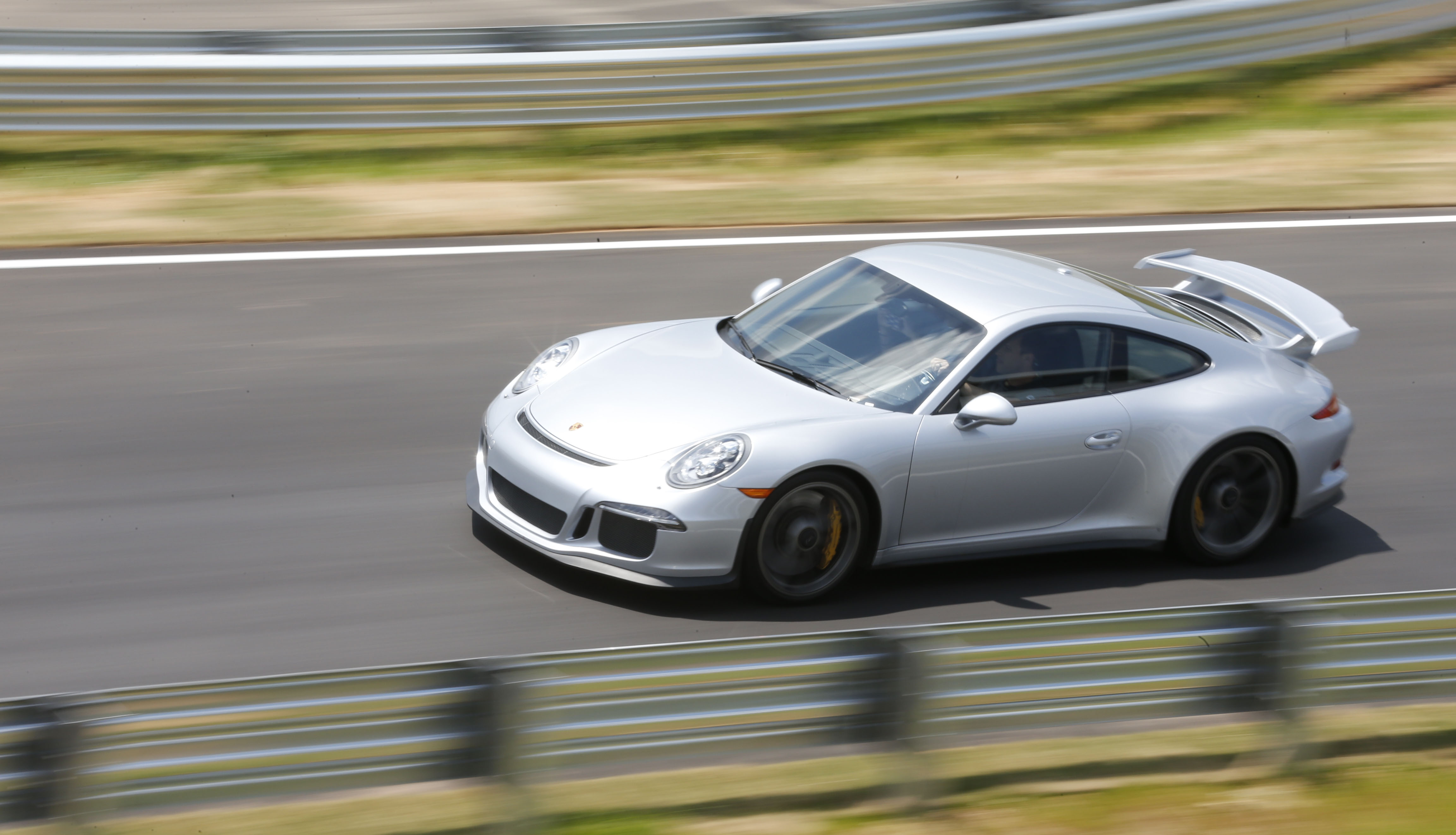 The Porsche Experience includes rides on their test track. BOB ANDRES / BANDRES@AJC.COM