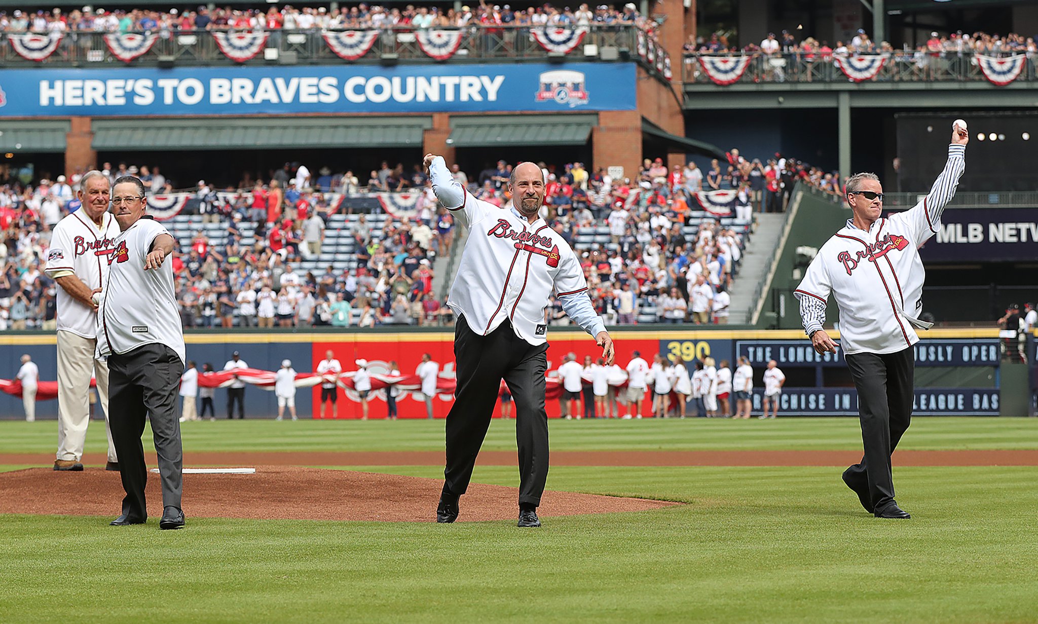 Major League Baseball Hall of Fame pitcher Tom Glavine talk during