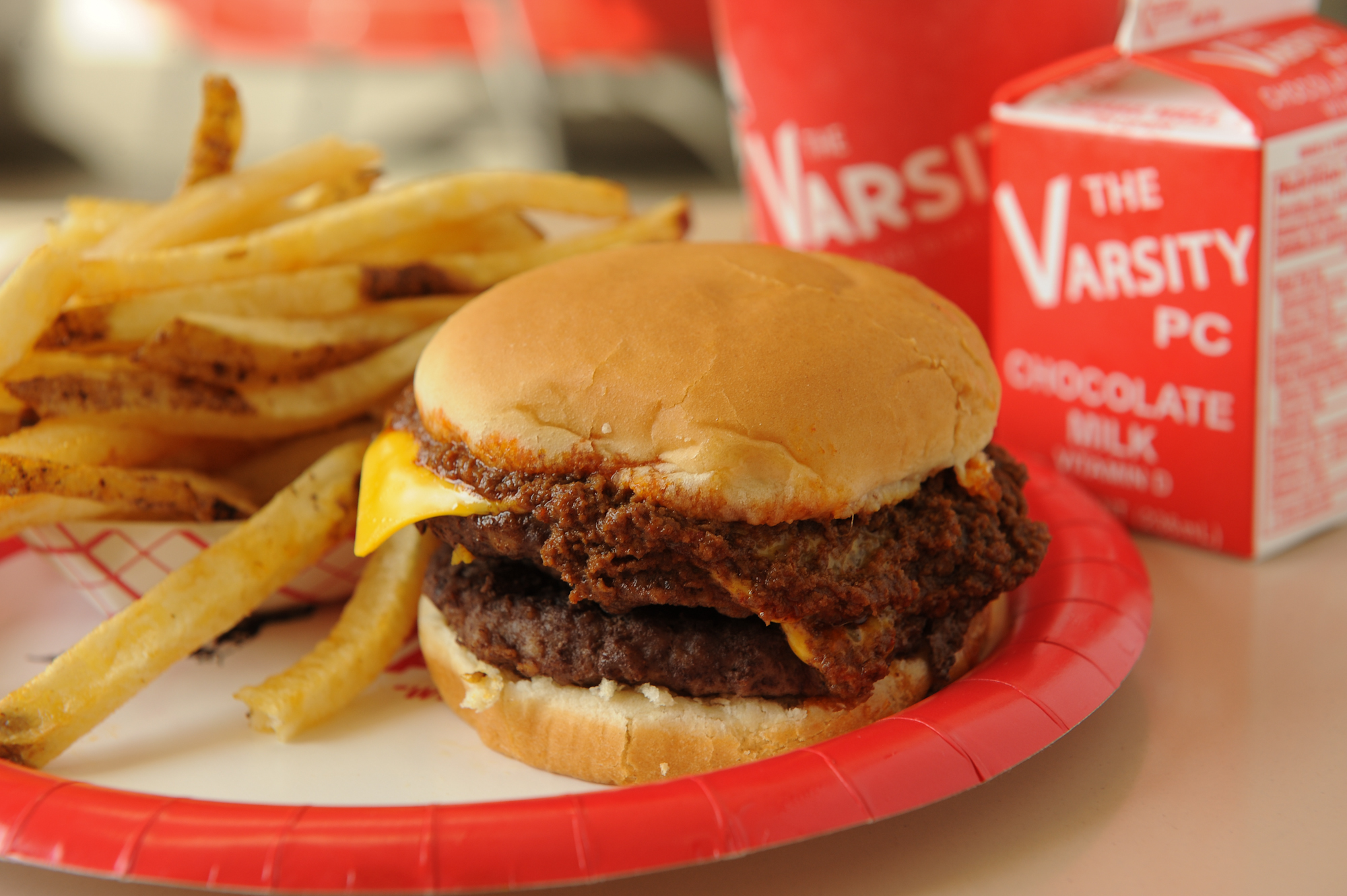 151013-ATLANTA-GA- Wendell Brock reports on the Varsity and its history of food and scene in Atlanta on Tuesday October 13, 2015. FOOD: Double chili cheese burger, fries and a Varsity PC (chocolate milk)(Becky Stein Photography)