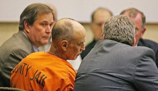 Gary Michael Hilton, flanked by public defender Rob McNeill (left), was charged with killing Meredith Emerson on Jan. 9, 2008