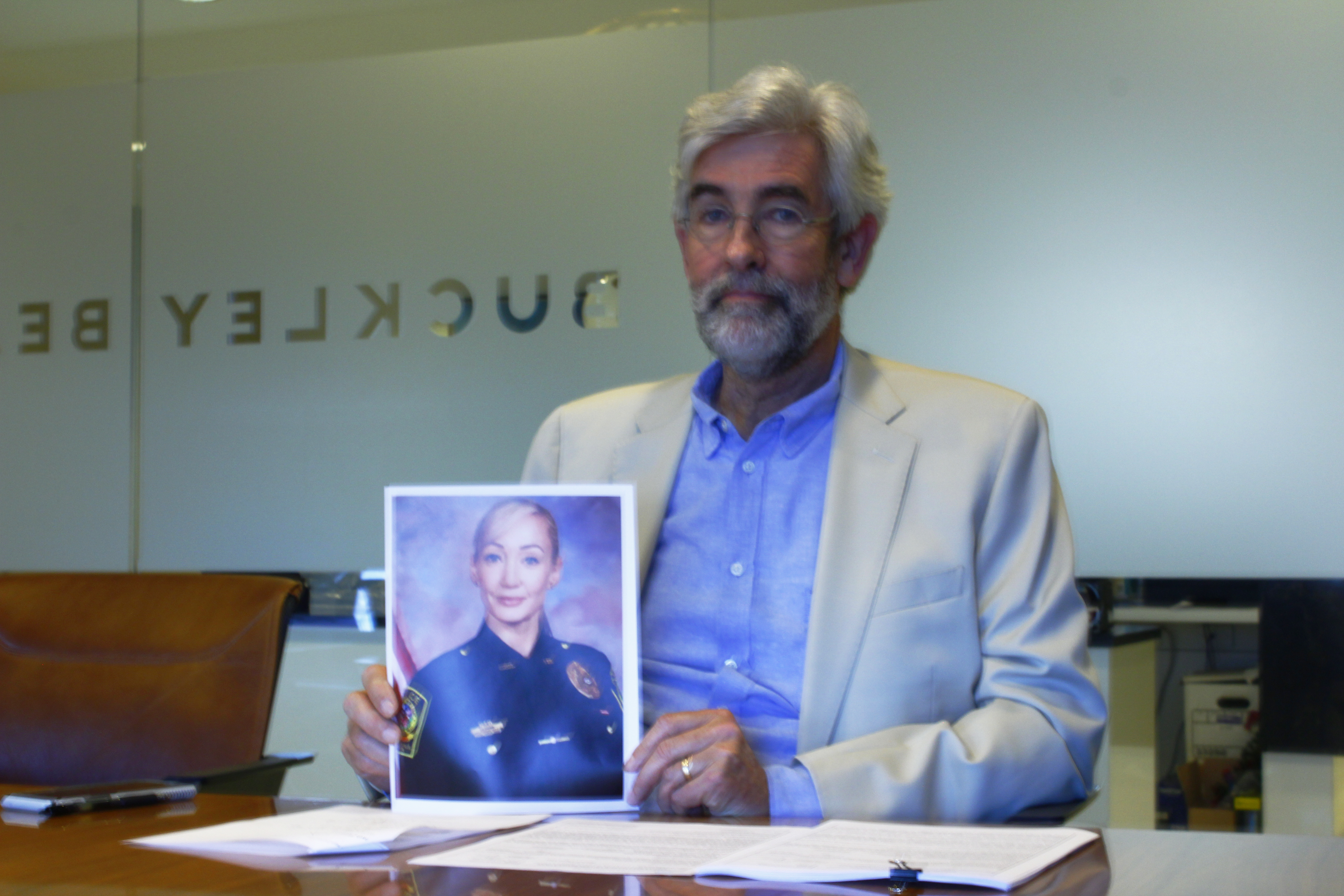 Even though Lawrenceville now holds that Capt. Tawyna Gilovanni has every right to speak to a reporter and anyone else as a private citizen, her attorney Ed Buckley said she isn't doing so because she still fears for her job if she speaks out. (Asia Simone Burns / Asia.Burns@ajc.com)