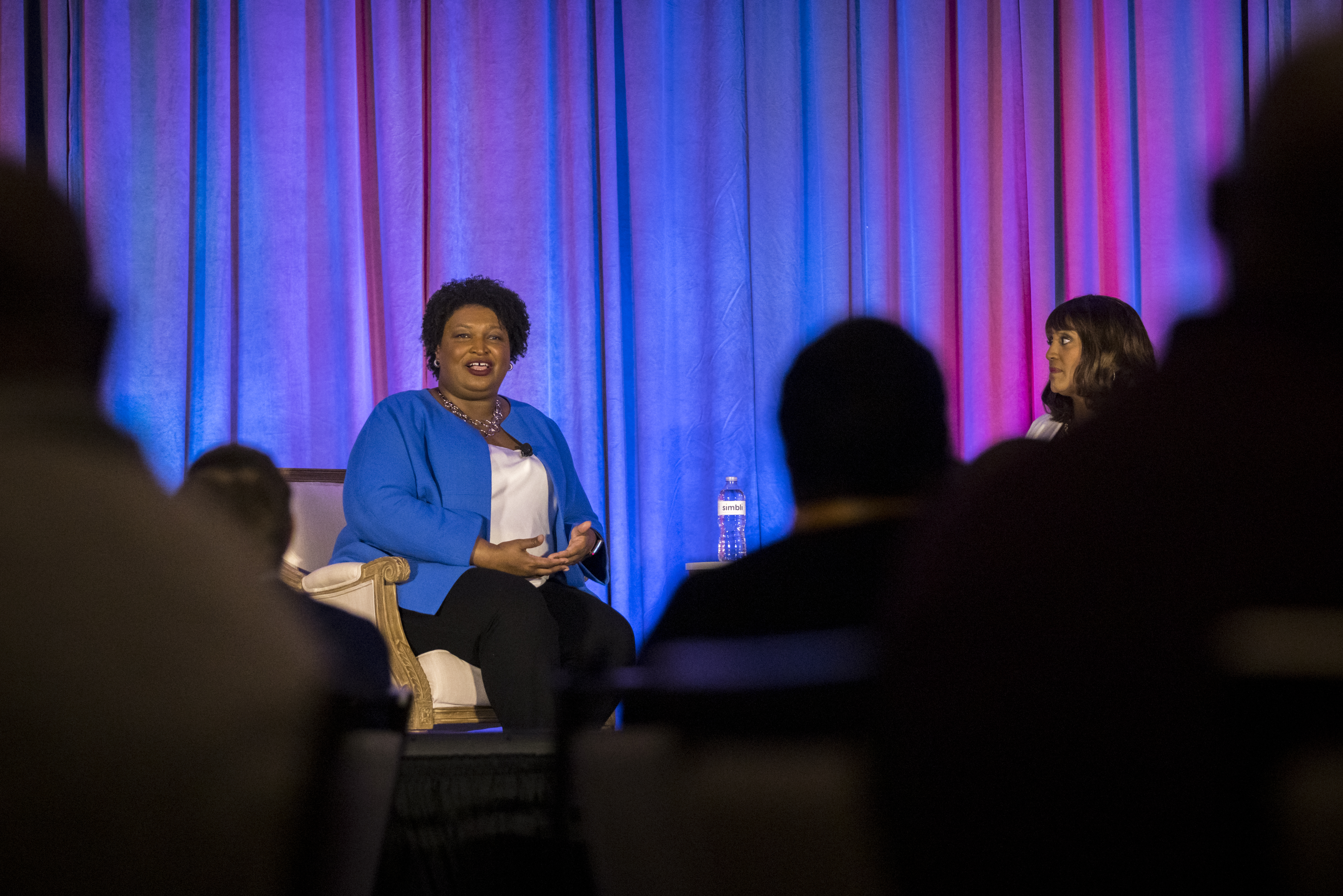 SAVANNAH, GEORGIA - JUNE 11, 2022: Gubernatorial candidate Stacey Abrams, right, speaks during the Georgia School Board Association Summer conference in Savannah. (Stephen B. Morton for The Atlanta Journal-Constitution).