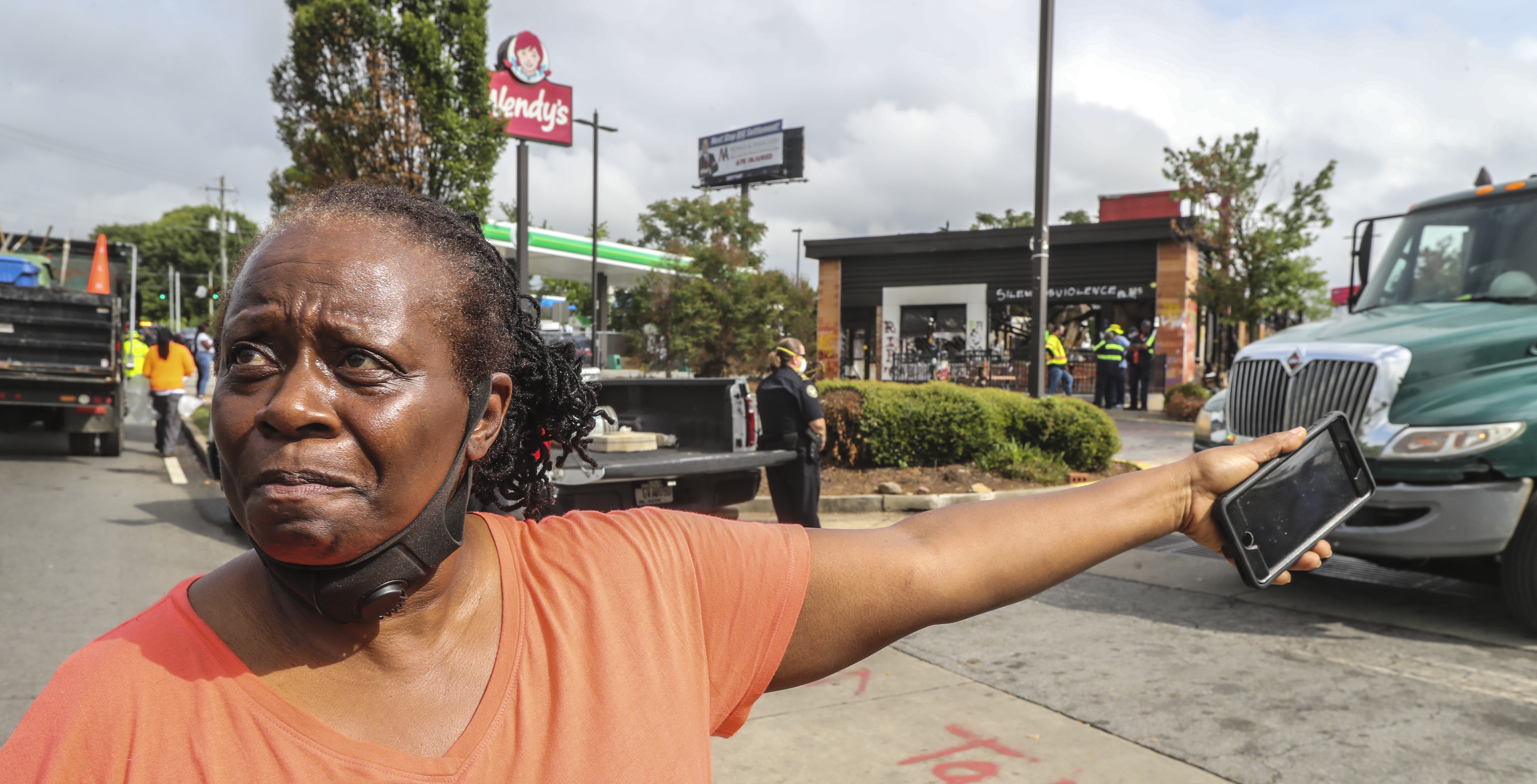 Atlanta City Councilperson, Joyce Sheperd was on the scene where Atlanta police and sanitation crews finished removing protesters and their belongings from outside the Wendy’s on Monday July 6, 2020 where Rayshard Brooks was shot and killed by an officer last month. The last concrete barricade was put in place around noon. Some of the protesters milled nearby while a worker from the BP gas station next door pulled boards off the windows. Monday’s cleanup followed a violent holiday weekend that started Saturday night when 8-year-old Secoriea Turner was fatally shot while sitting in a car near the restaurant. The site has served as ground zero for protests since Brooks was shot in the parking lot following an attempted DUI arrest in the drive-thru line June 12. The restaurant was destroyed during a large protest the next day. JOHN SPINK/JSPINK@AJC.COM