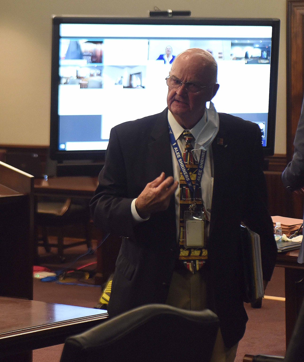 Prosecutor John B. Johnson III heads back to his area during the hearing for Dennis Perry. RYON HORNE (AJC)