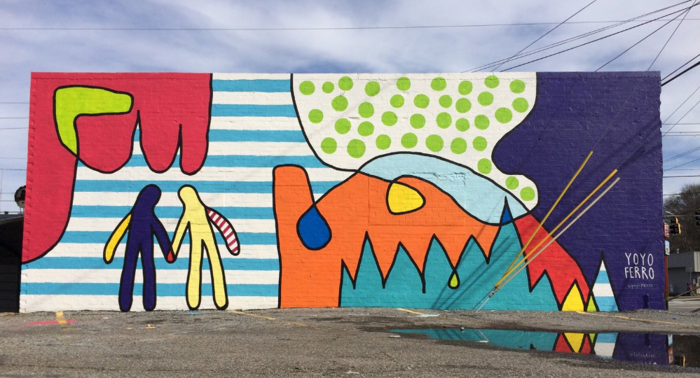 This work, by plaintiff Yoyo Ferro, is located on the side of a salon at Memorial Drive and Moreland Avenue.