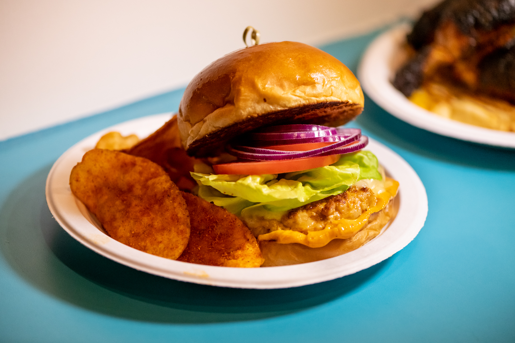 Though rotisserie chicken plates are the star at Nani’s Piri Piri Chicken, Nani's Chicken Burger is among the other popular features. (Mia Yakel for The Atlanta Journal-Constitution)