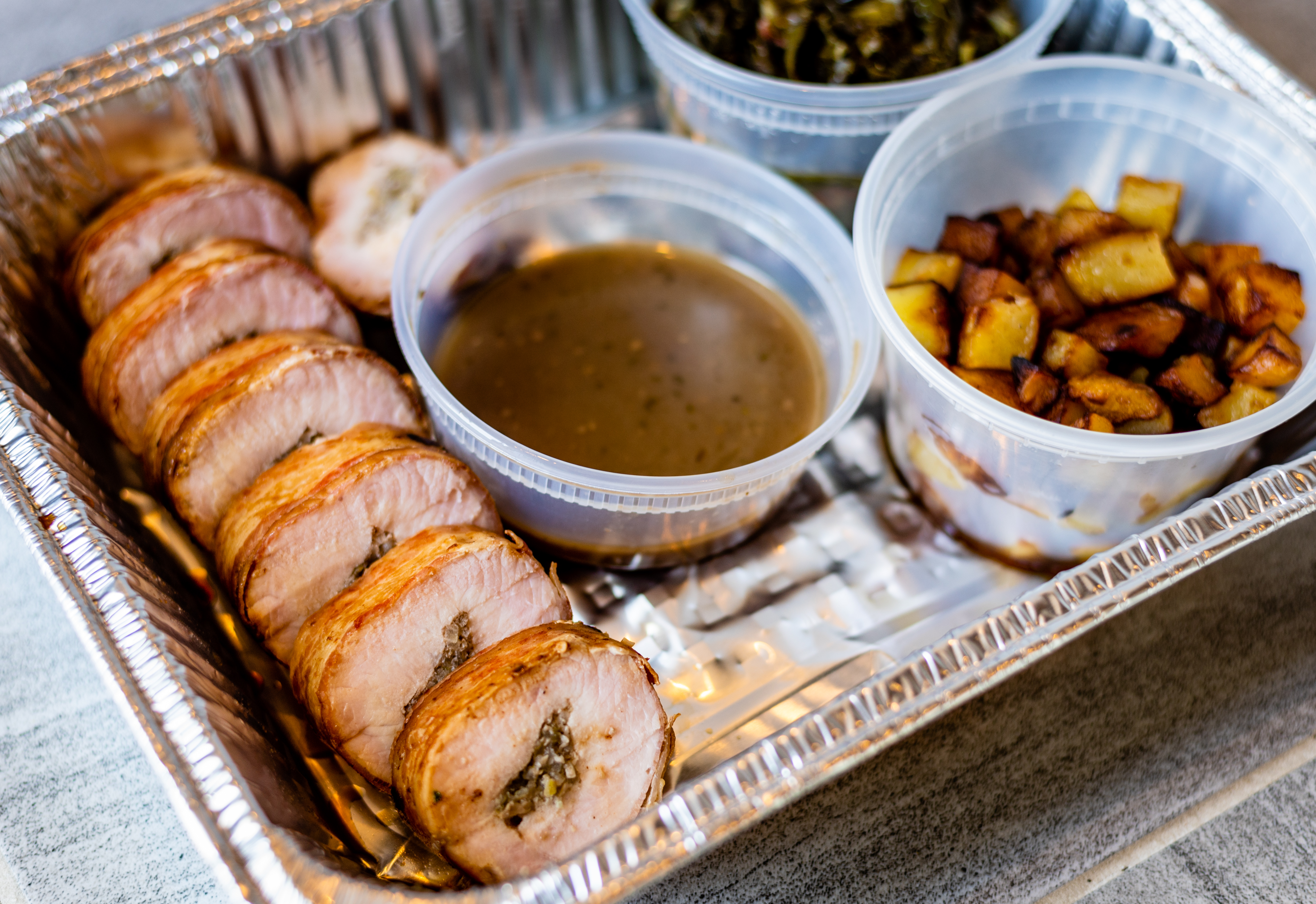 This serving of bacon-crusted pork loin from Lazy Betty was comfort food, perfectly executed.