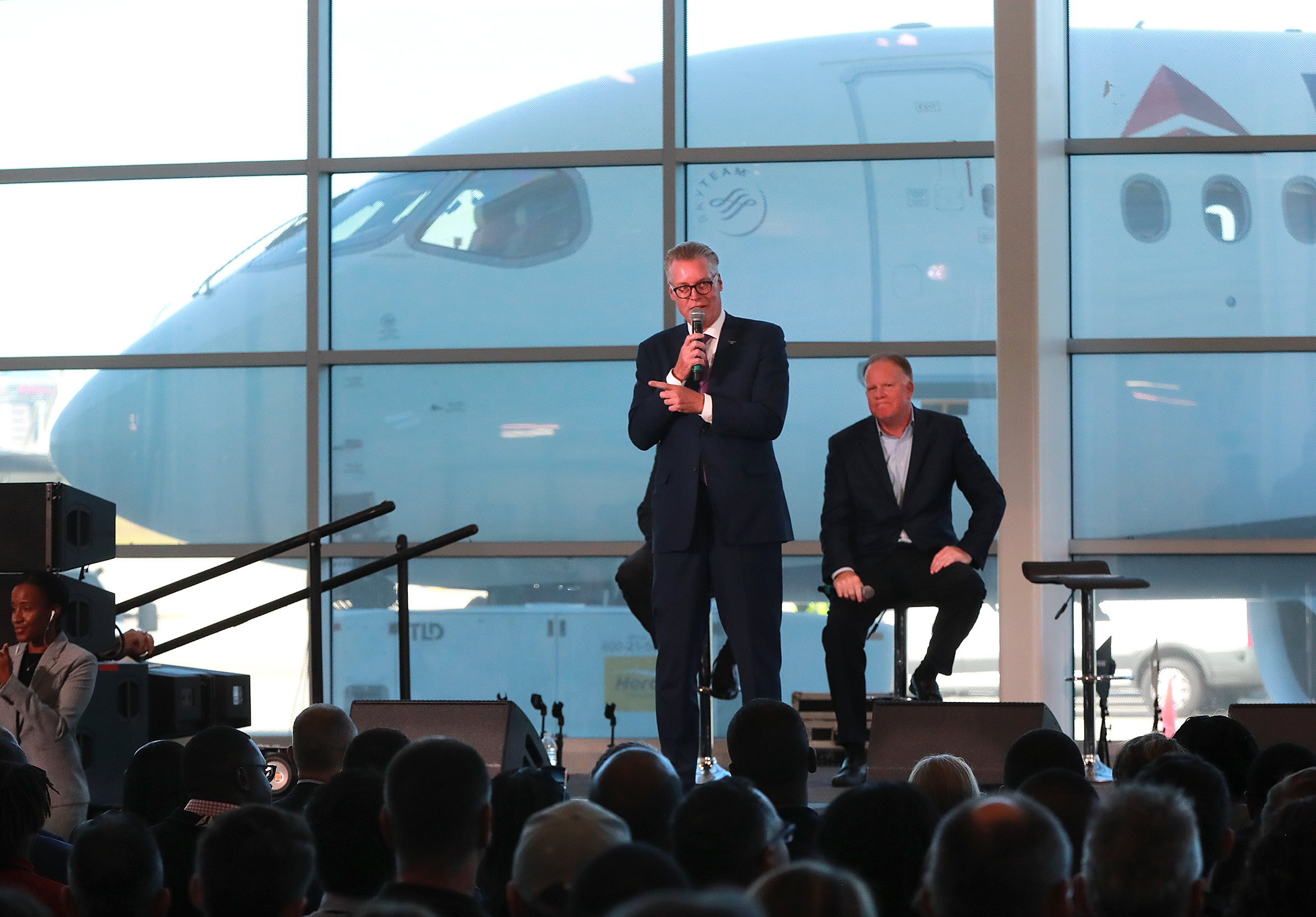 Delta CEO Ed Bastian (left) and COO Gil West unveil the new A220 aircraft while celebrating the 10-year anniversary of merging with Northwest at the Delta Air Lines TechOps on Monday, Oct 29, 2018, in Atlanta. Bastian has said an anti-union flyer circulated by management “wasn’t well crafted” but that the airlines was and always would be pro-people. Curtis Compton/ccompton@ajc.com