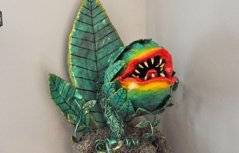 Fibus' venus fly trap sculpture, inspired by Audrey II from "Little Shop of Horrors", sits in the corner of his living room.