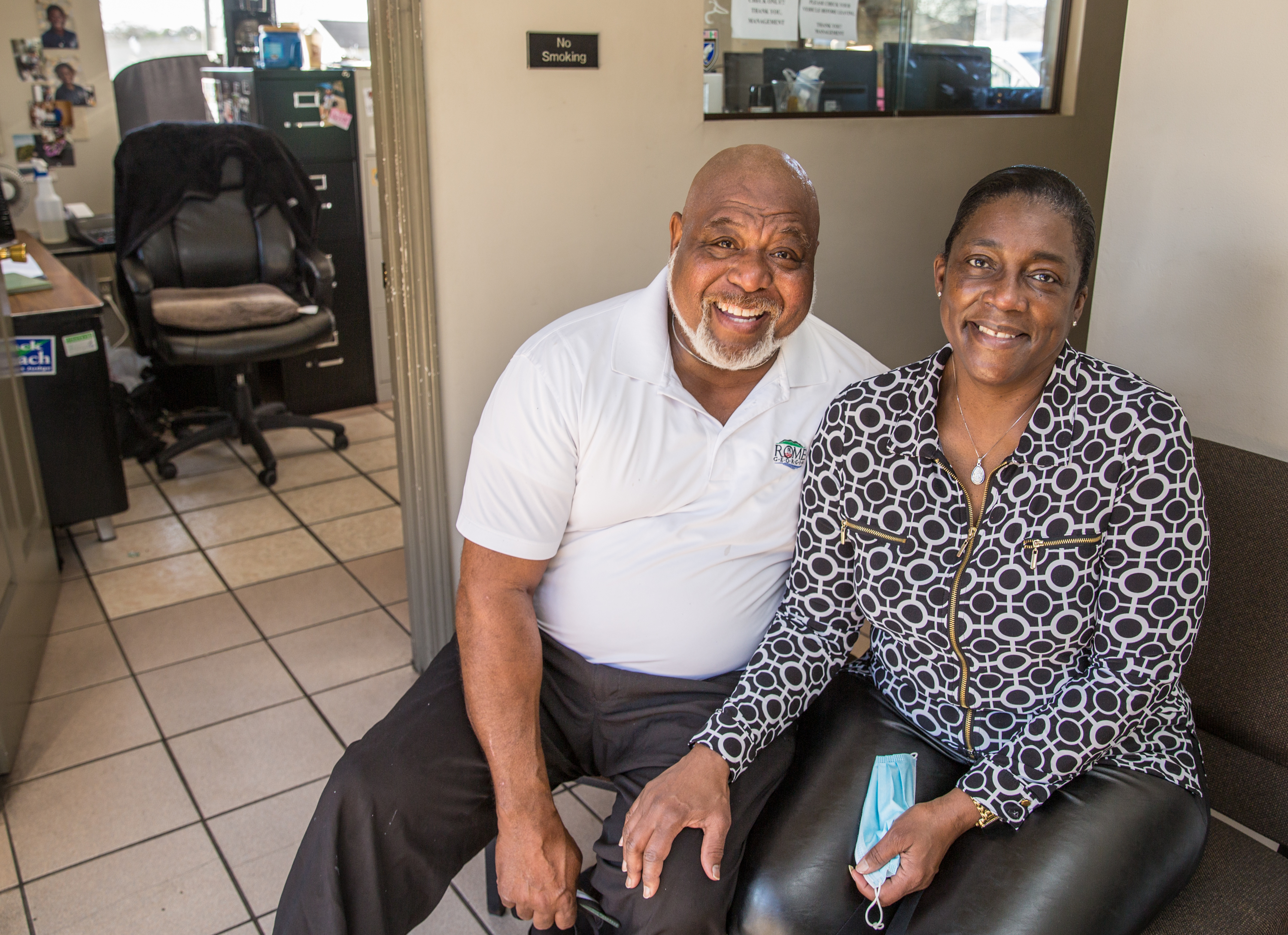 Bill and Faith Collins both tested positive for COVID-19 in November and were given monoclonal antibody treatments and are now back to work at Collins Auto Treatment in Rome. (Jenni Girtman for The Atlanta Journal-Constitution)
