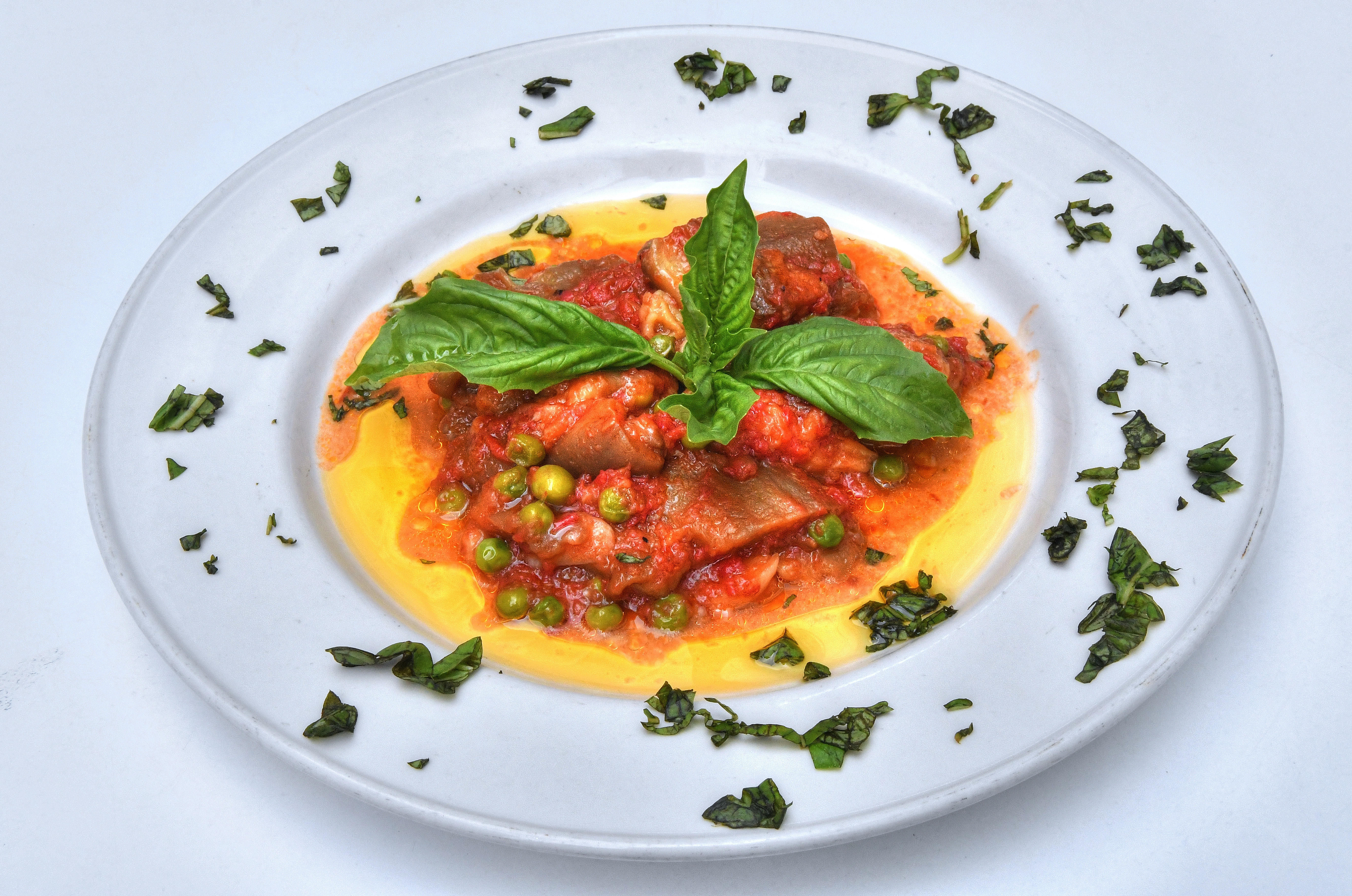 Kameel Srouji, chef-owner of Aviva by Kameel, attributes the recipe for Eggplant, Huda Style to his Lebanese mother. Srouji grew up in Nazareth. (Styling by chef Kameel Srouji / Chris Hunt for the AJC)