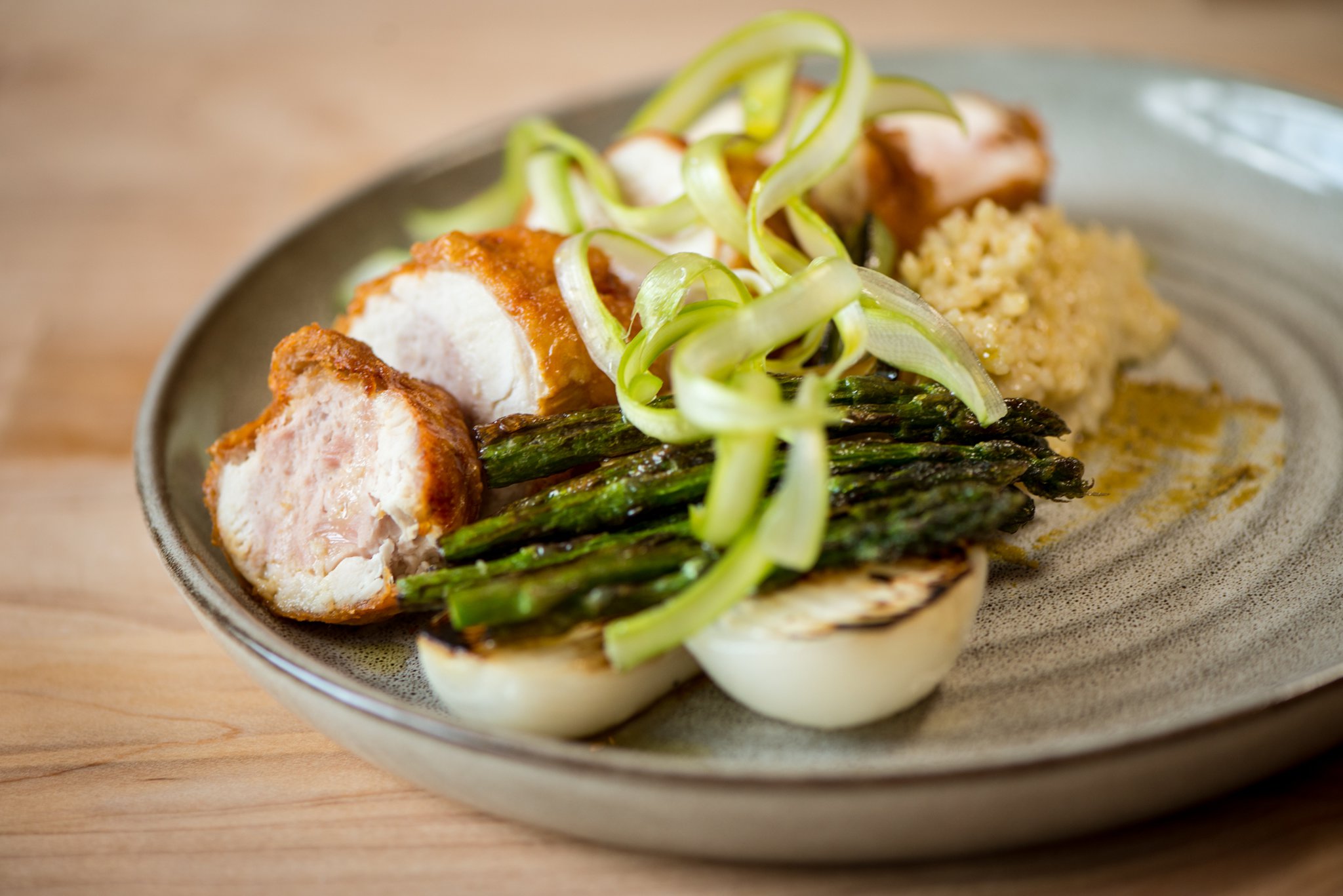 Chicken, asparagus, vidalia onion, freekeh, pistachio. Photo credit- Mia Yakel.
