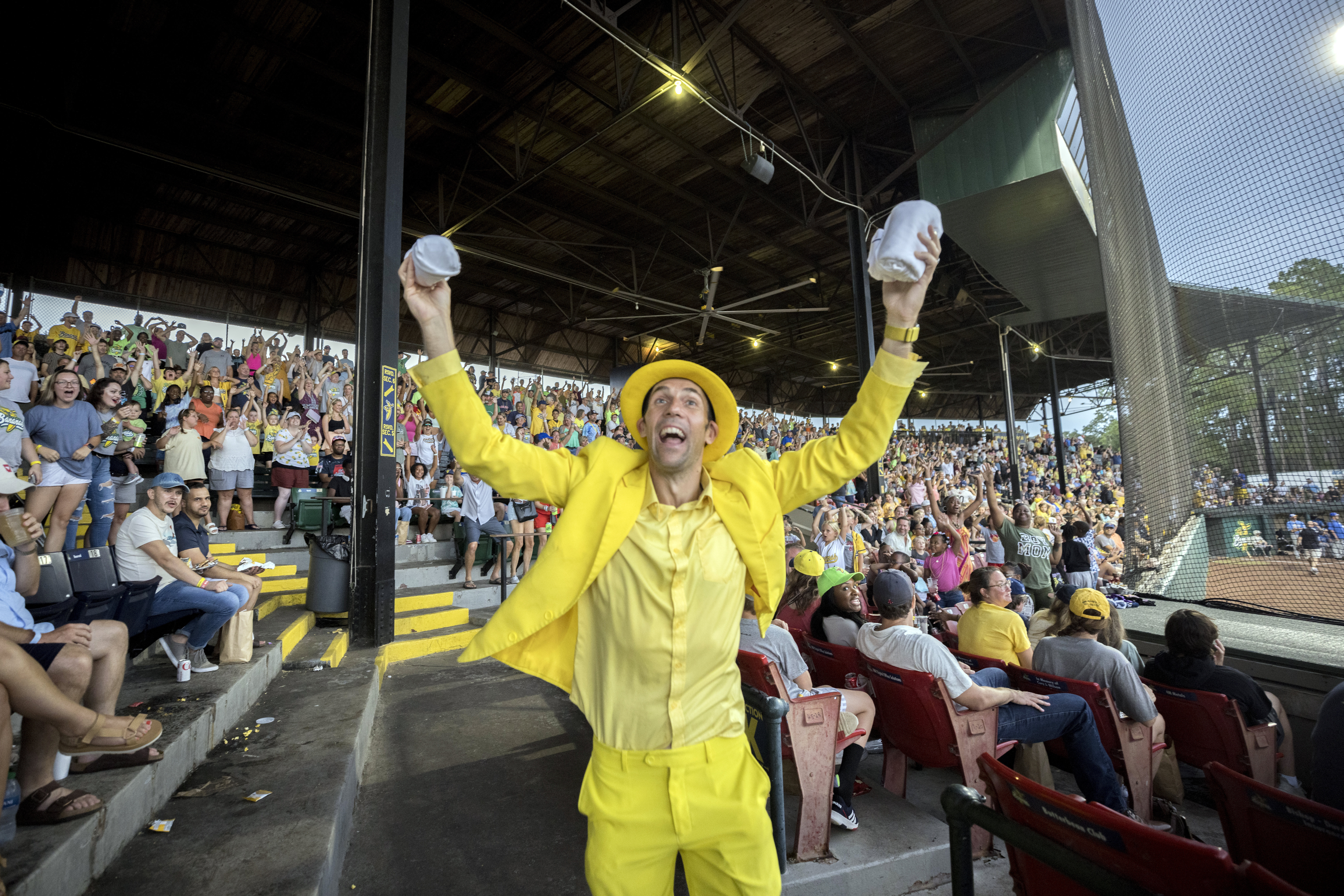 Savannah Bananas owner Jesse Cole tosses out T-shirts during a game at Historic Grayson Stadium. (AJC Photo/Stephen B. Morton)