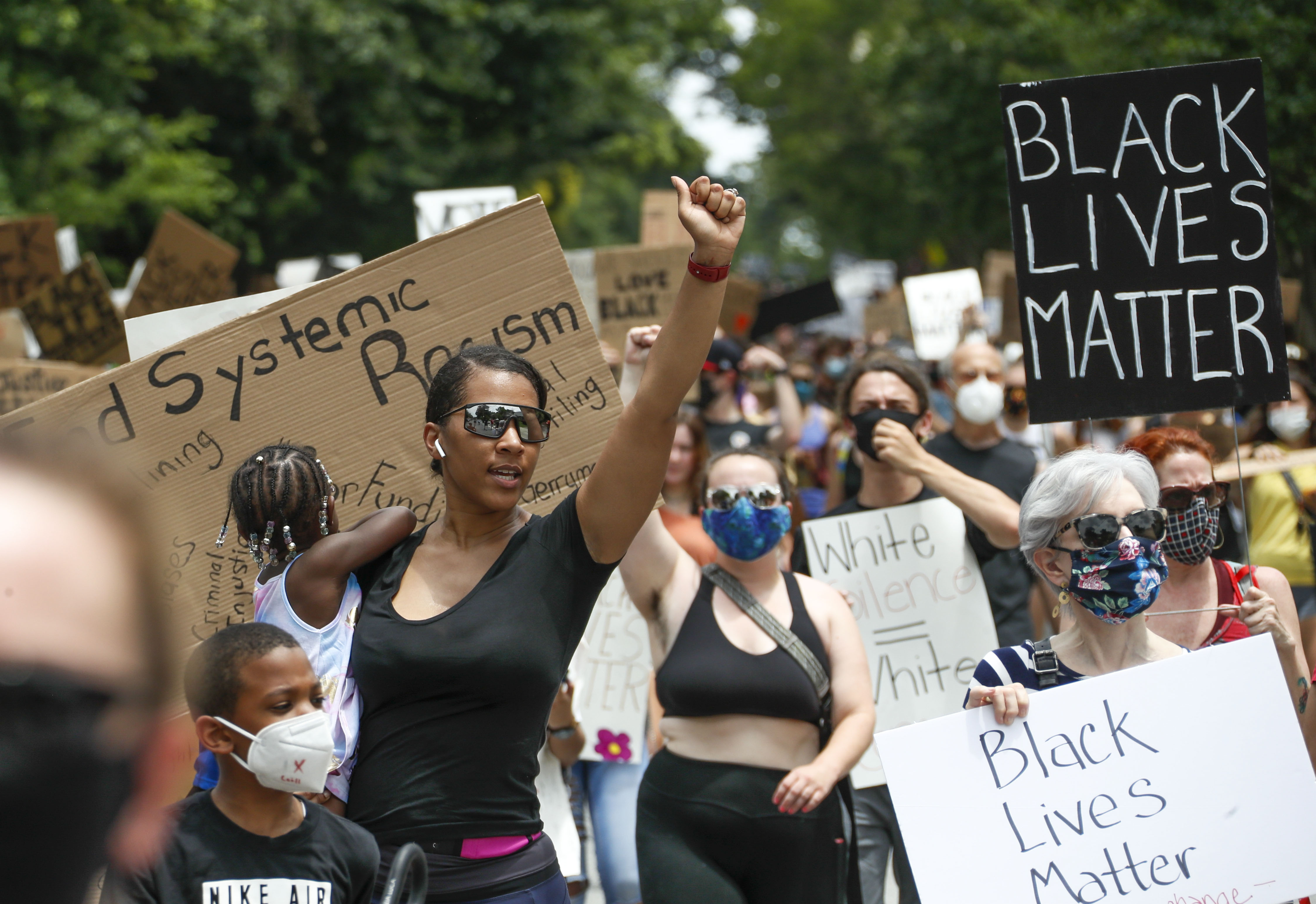 On a day that would have been the start of Summerfest, canceled due to the pandemic, about 1,000 protesters gathered at the corner of Virginia and North Highland avenues and marched down Virginia Avenue to Piedmont Park, where they planned to join with other protest groups and march downtown. (Photo: Bob Andres / bandres@ajc.com)
