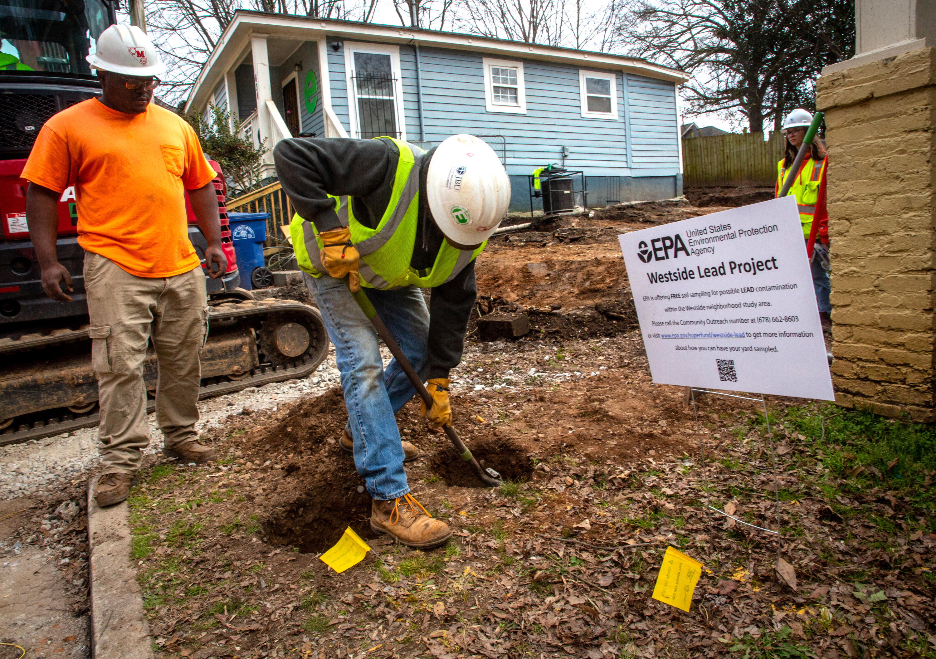 Workers remove dirt from a property in the Westside Lead Superfund site in Atlanta on Wednesday, February 2, 2022. The site was added this week to the EPA's National Priorities List, which will pave the way for more funding and resources for cleanup. STEVE SCHAEFER FOR THE ATLANTA JOURNAL-CONSTITUTION