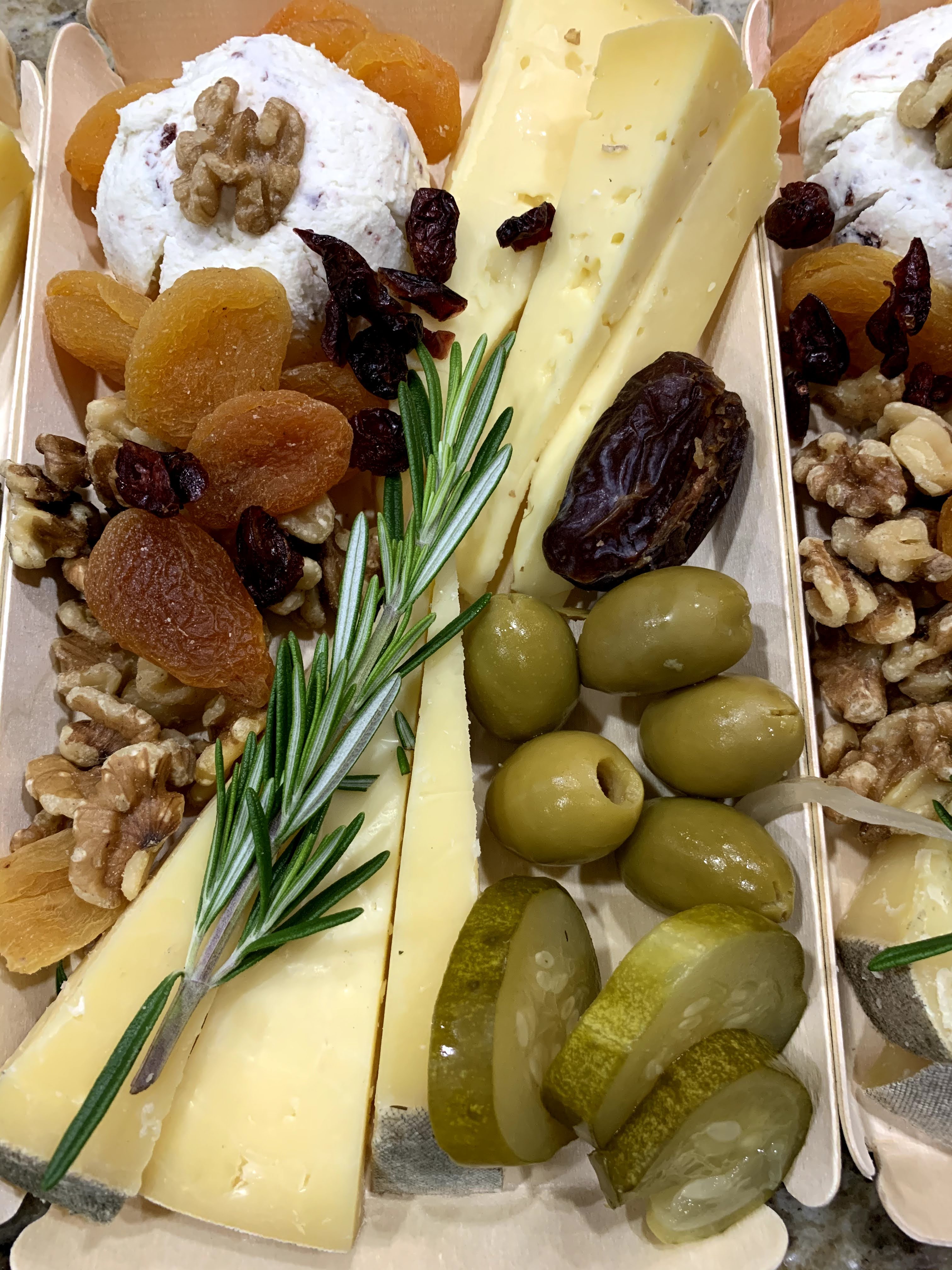 A cheeseboard can be made for individual servings, like this one featuring wedges of Concord tomme and fresh goat’s cheese. Courtesy of CalyRoad