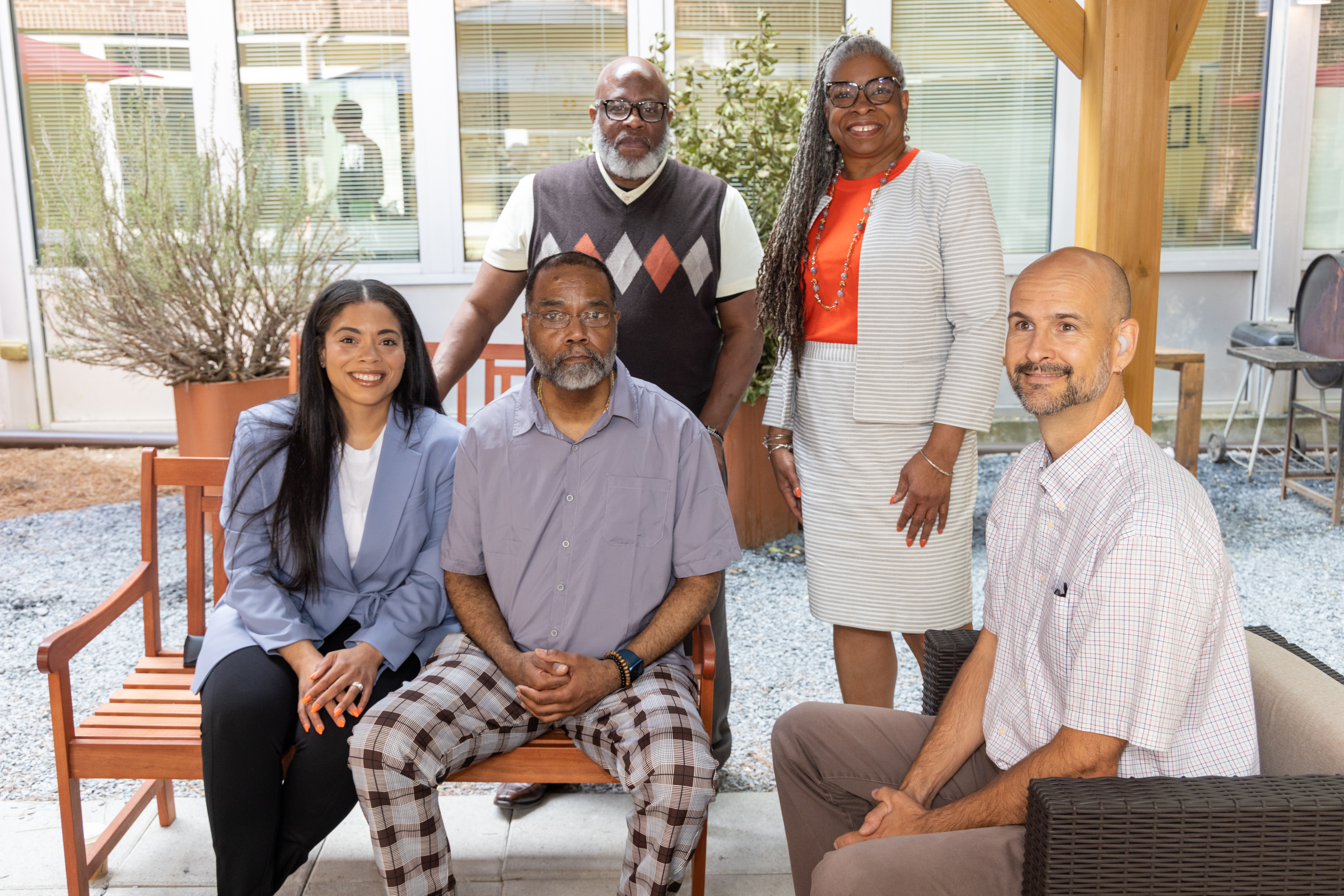 Ivy Porter-Henderson (from left), Bradley Porter, Dominic Johnson, Carol Collard and Kevin Henderson in the Hope House courtyard in Atlanta.
PHIL SKINNER FOR THE ATLANTA JOURNAL-CONSTITUTION.