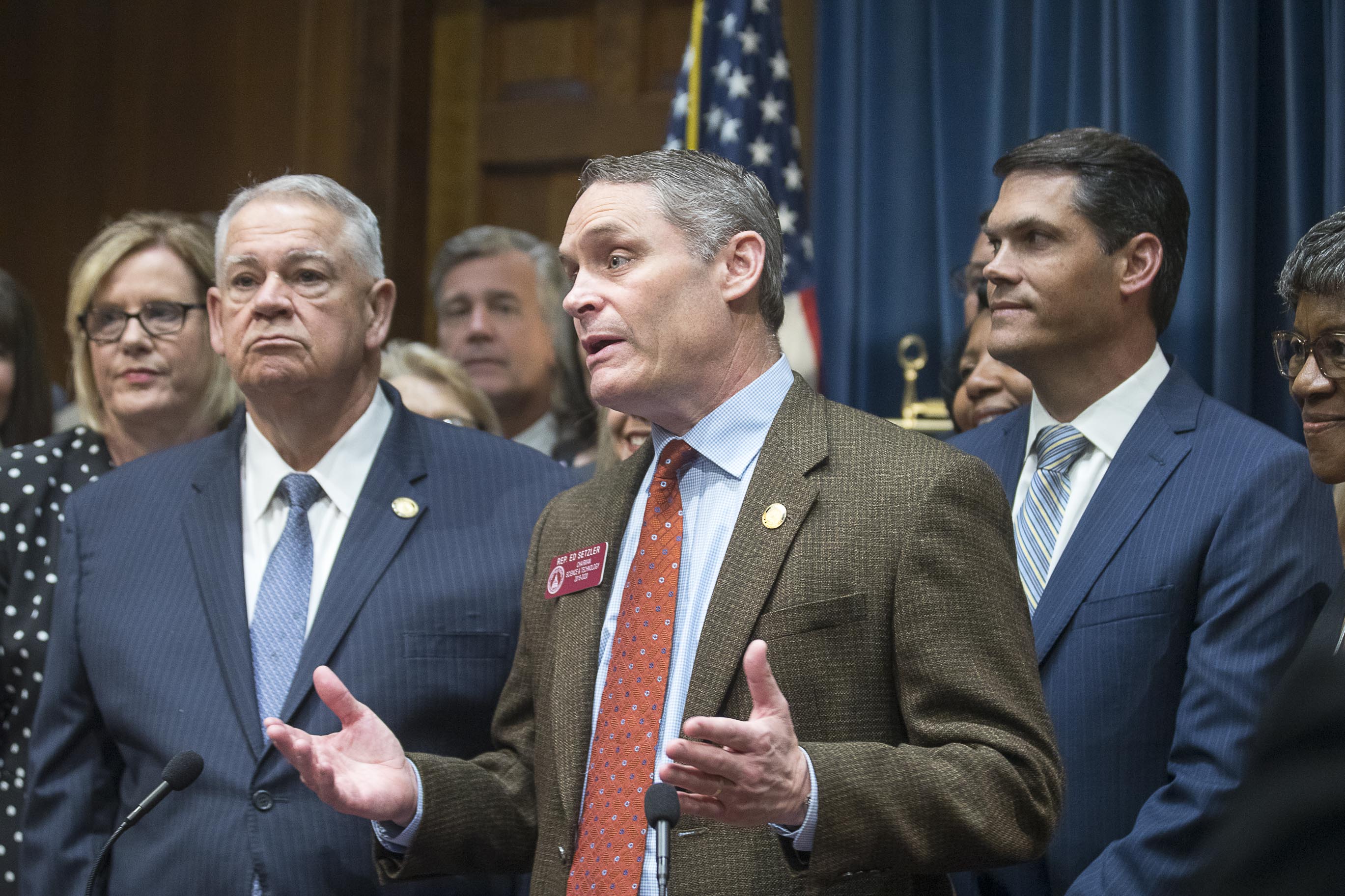 Georgia Speaker of the House David Ralston (left) and Georgia Lieutenant Governor Geoff Duncan (right) listen as Georgia Representative Ed Setzler (center) thanks his supporters during a press conference for the signing of HB 481 in the Governor’s office at the Georgia State Capitol building on May 7. (ALYSSA POINTER/ALYSSA.POINTER@AJC.COM)