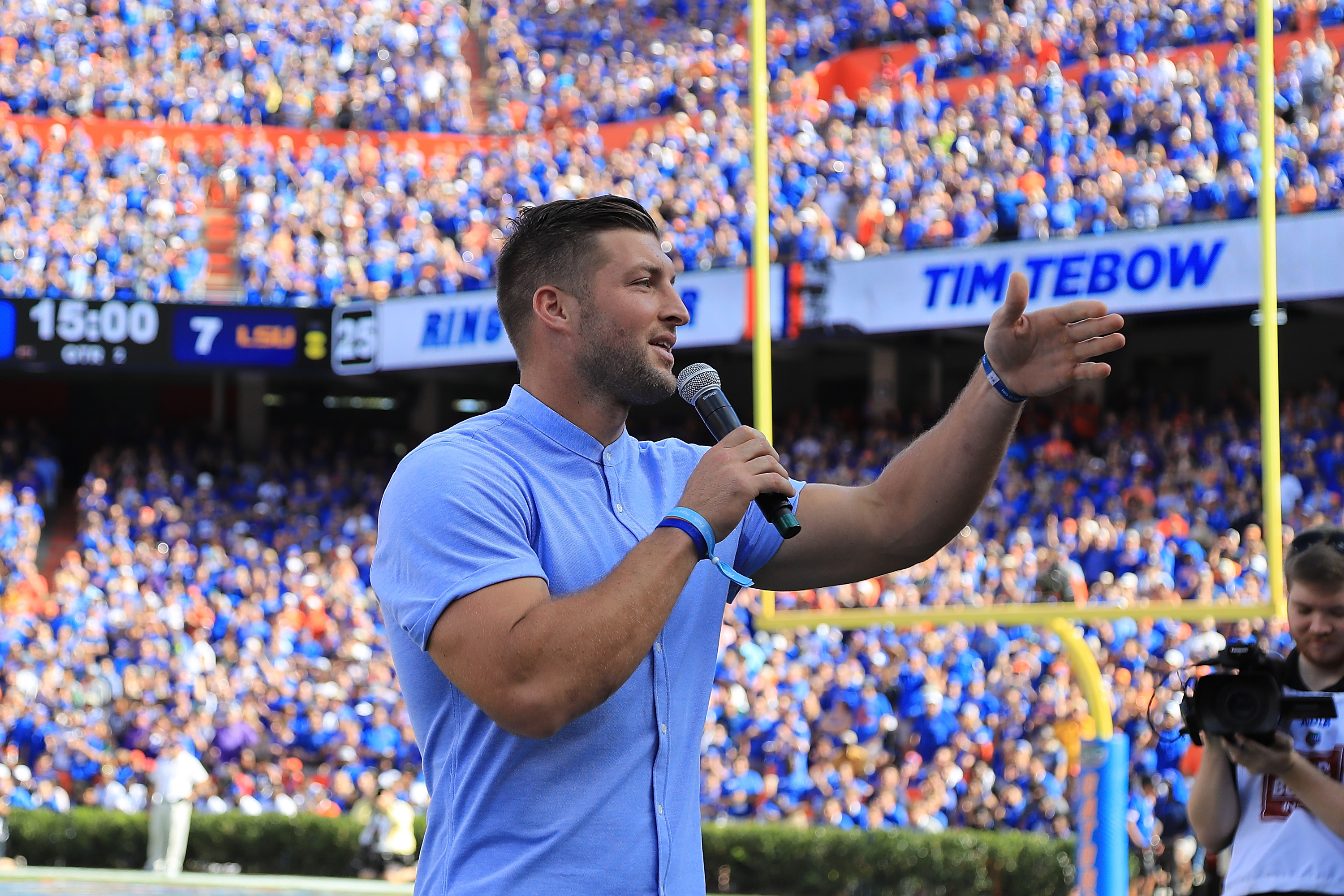 Florida Gator quarterback Tim Tebow (15) watches Arkansas