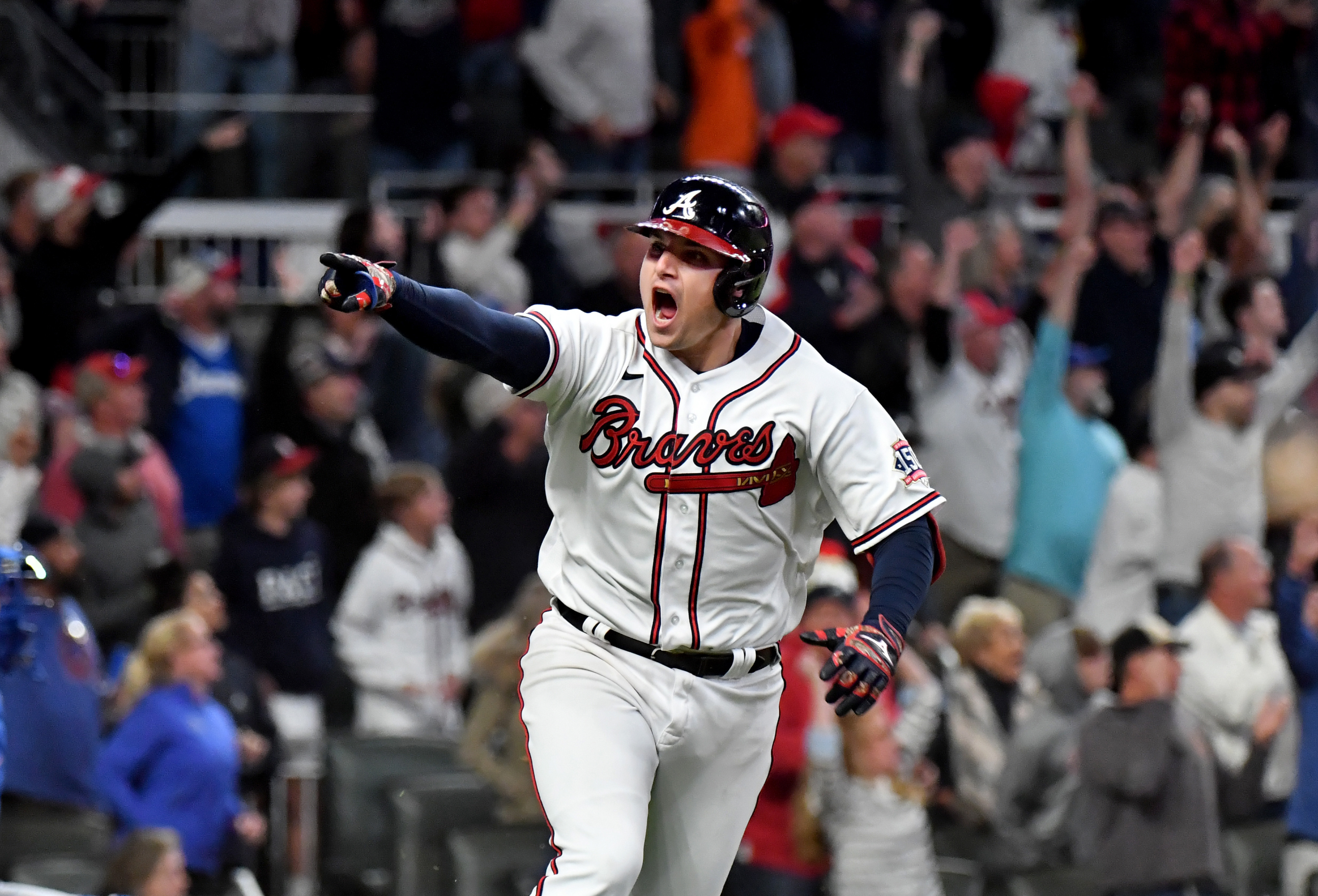 Atlanta Braves third baseman Austin Riley is greeted at home plate by  News Photo - Getty Images