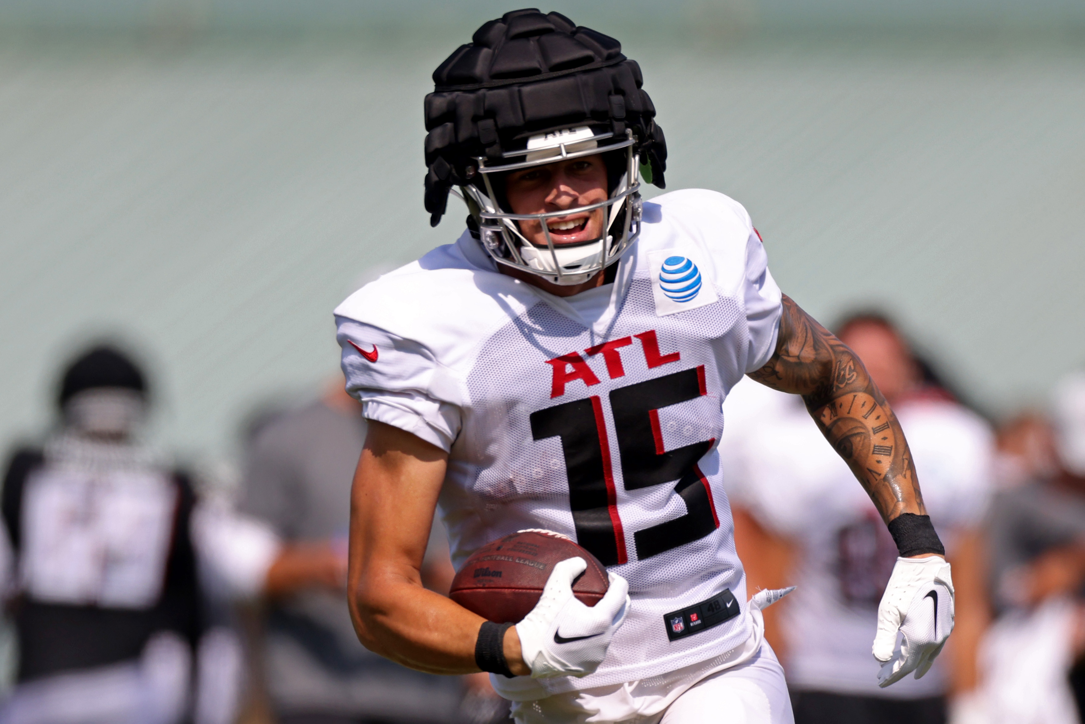 Atlanta Falcons quarterback Feleipe Franks (15) runs for the play