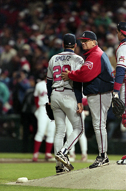 Bobby Cox pulls John Smoltz after a disastrous start in Game 3 of the World Series, Oct. 24, 1995, in Cleveland.