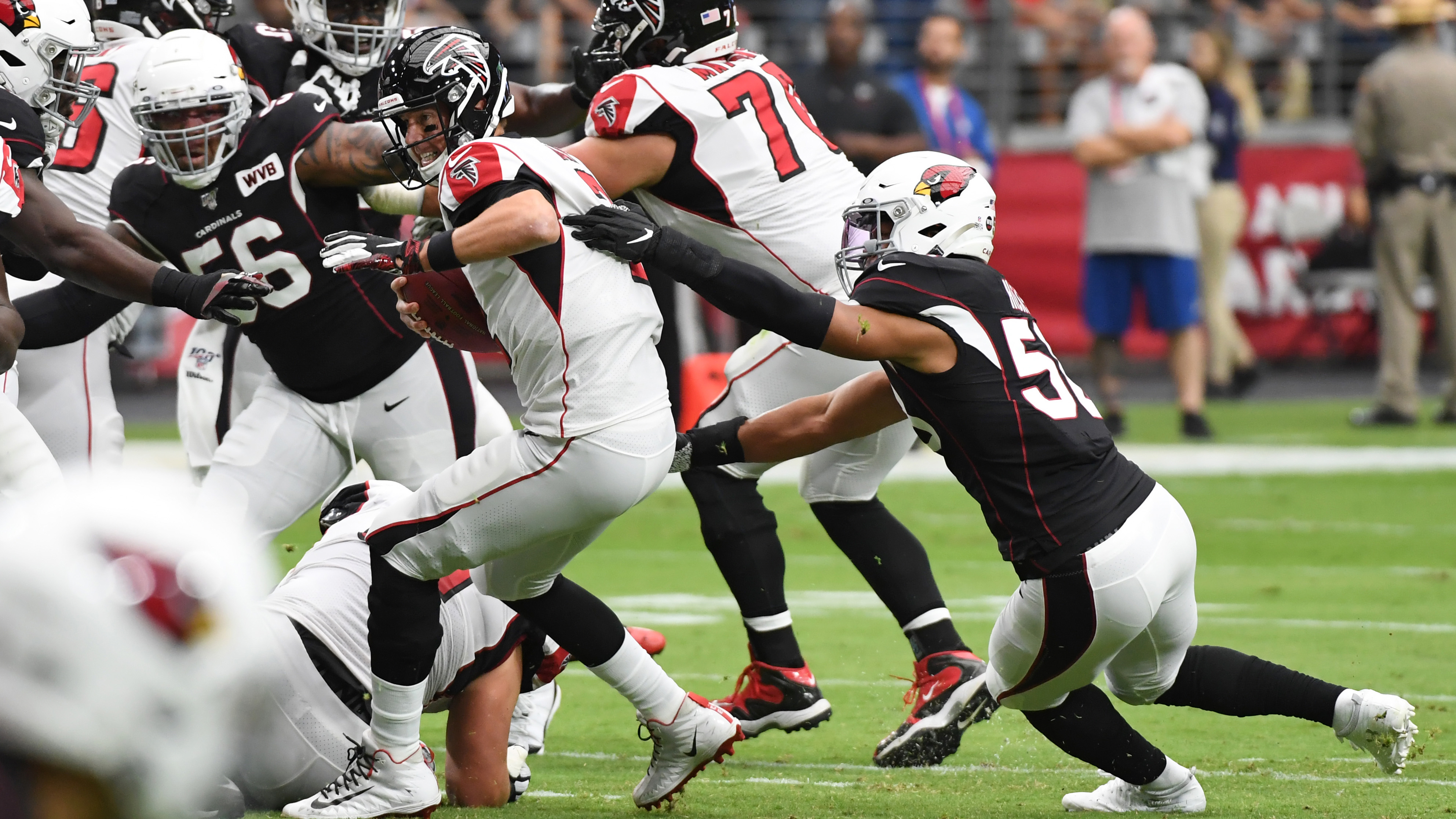 Cardinals beat Falcons 34-33 after Bryant's extra point miss