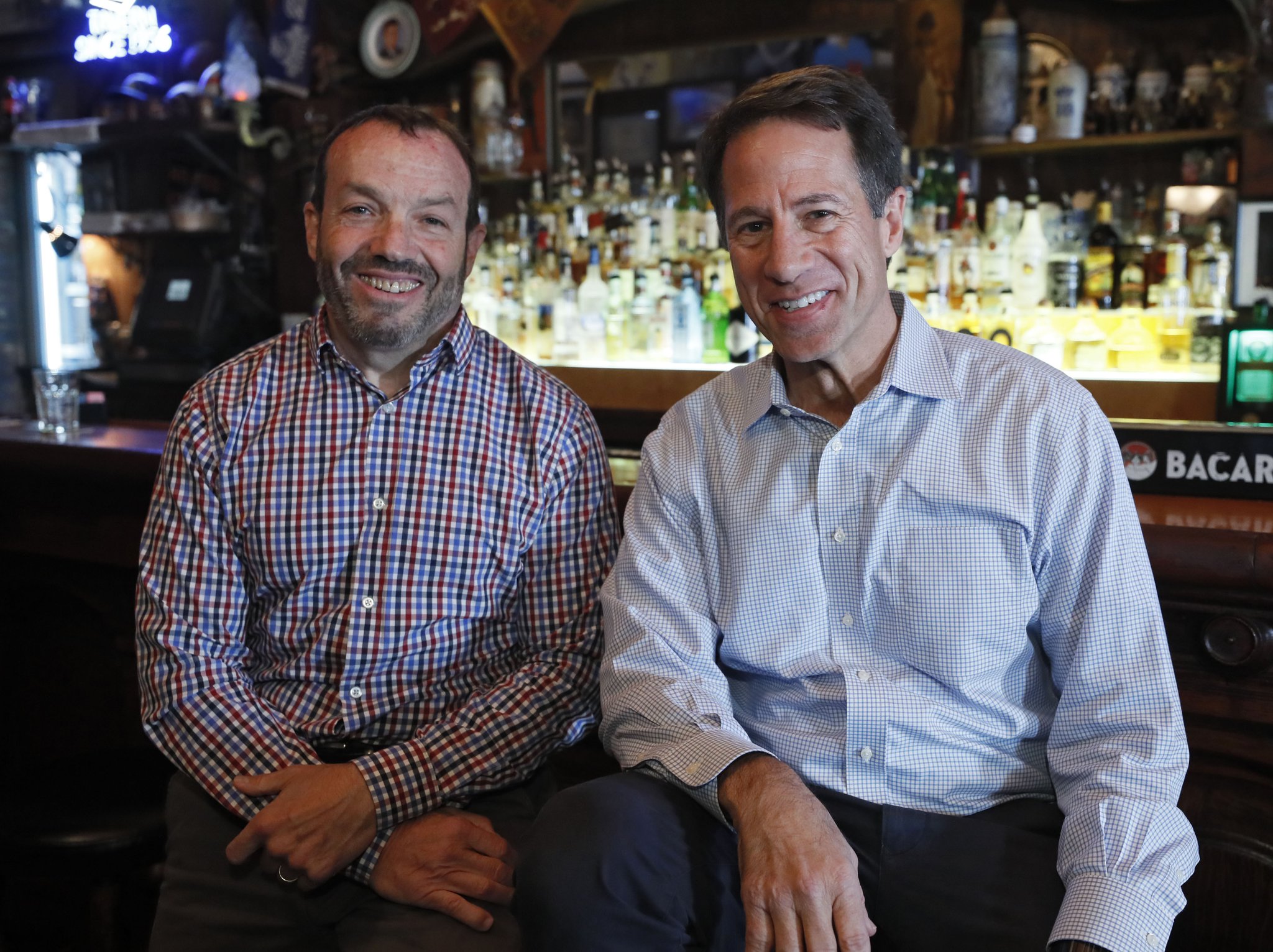Kent Alexander (right) and Kevin Salwen, co-authors of “The Suspect,” a new book about Richard Jewell, during an event at Manuel’s Tavern in Atlanta. (Bob Andres / robert.andres@ajc.com)