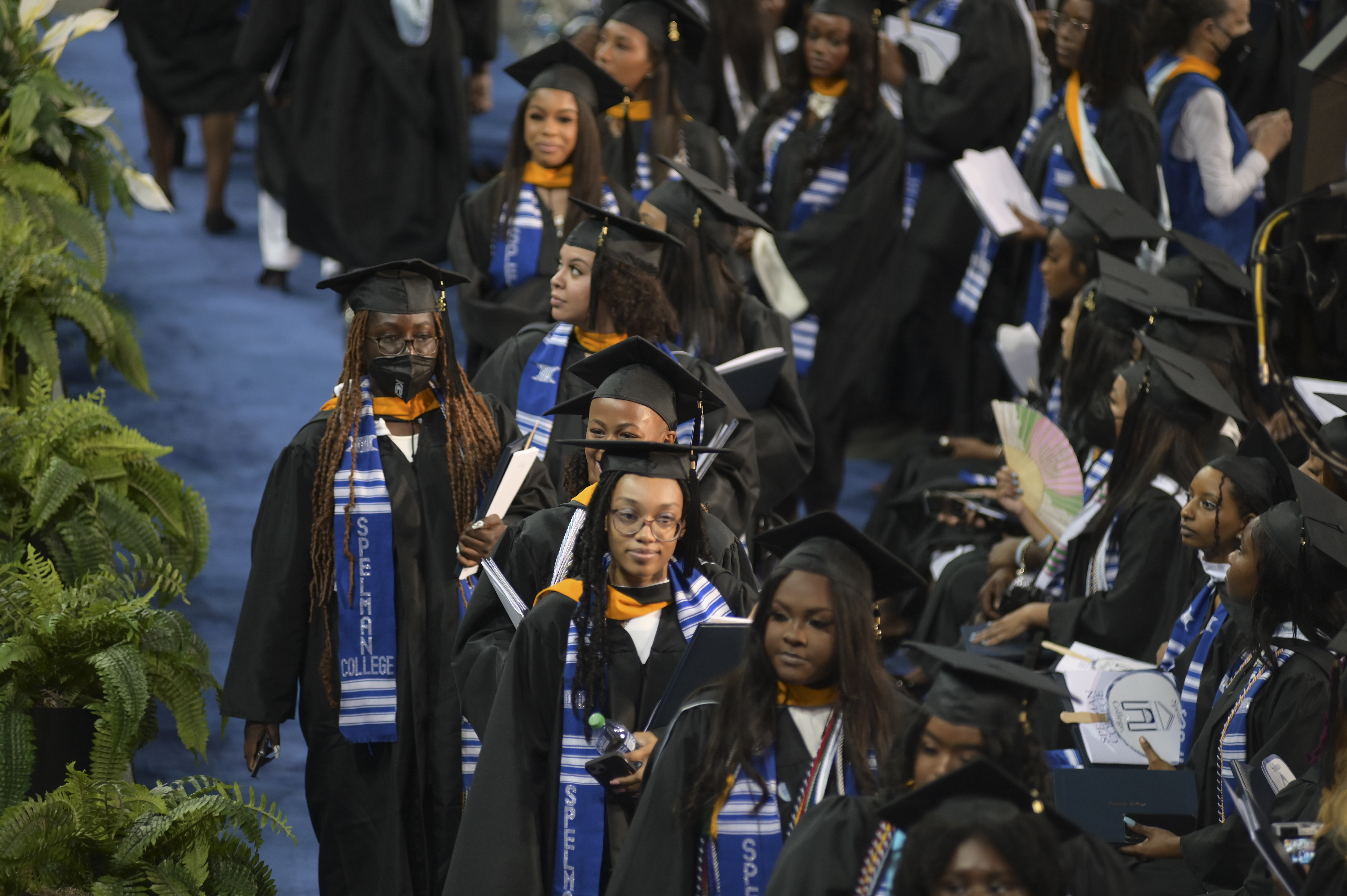 Spelman graduates exit the 2022 Spring Commencement at McCamish Pavilion in Atlanta on Sunday May 15, 2022. (Natrice Miller / natrice.miller@ajc.com)