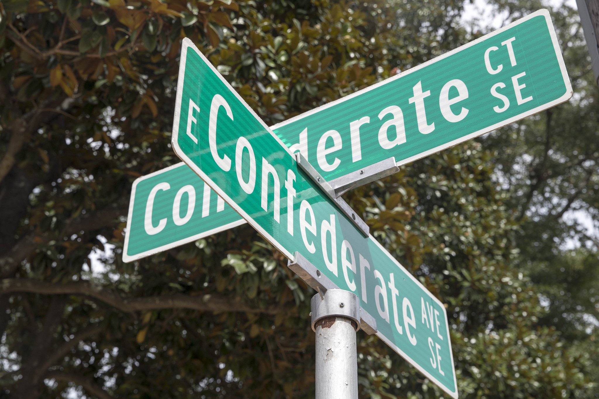Street signs display the intersection of East Confederate Avenue SE and Confederate Court SE in Atlanta on Sept. 6, 2018.