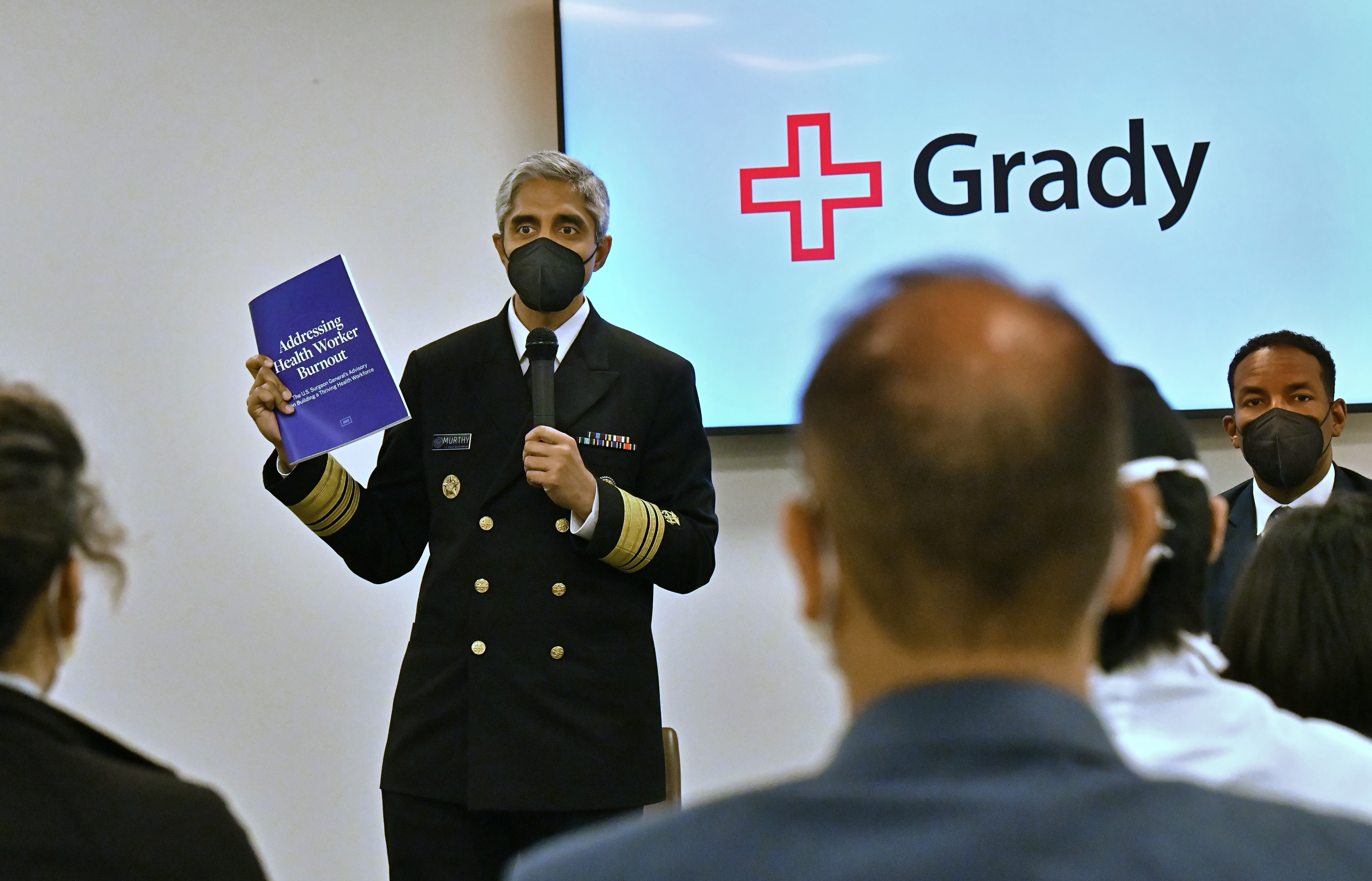 May 26, 2022  Atlanta - U.S. Surgeon General Dr. Vivek Murthy holds a a copy of a study and advisory released this week by his office to address healthcare workers’ burnout. He spoke to workers at Grady Memorial Hospital on Thursday, May 26, 2022. (Hyosub Shin / Hyosub.Shin@ajc.com)
