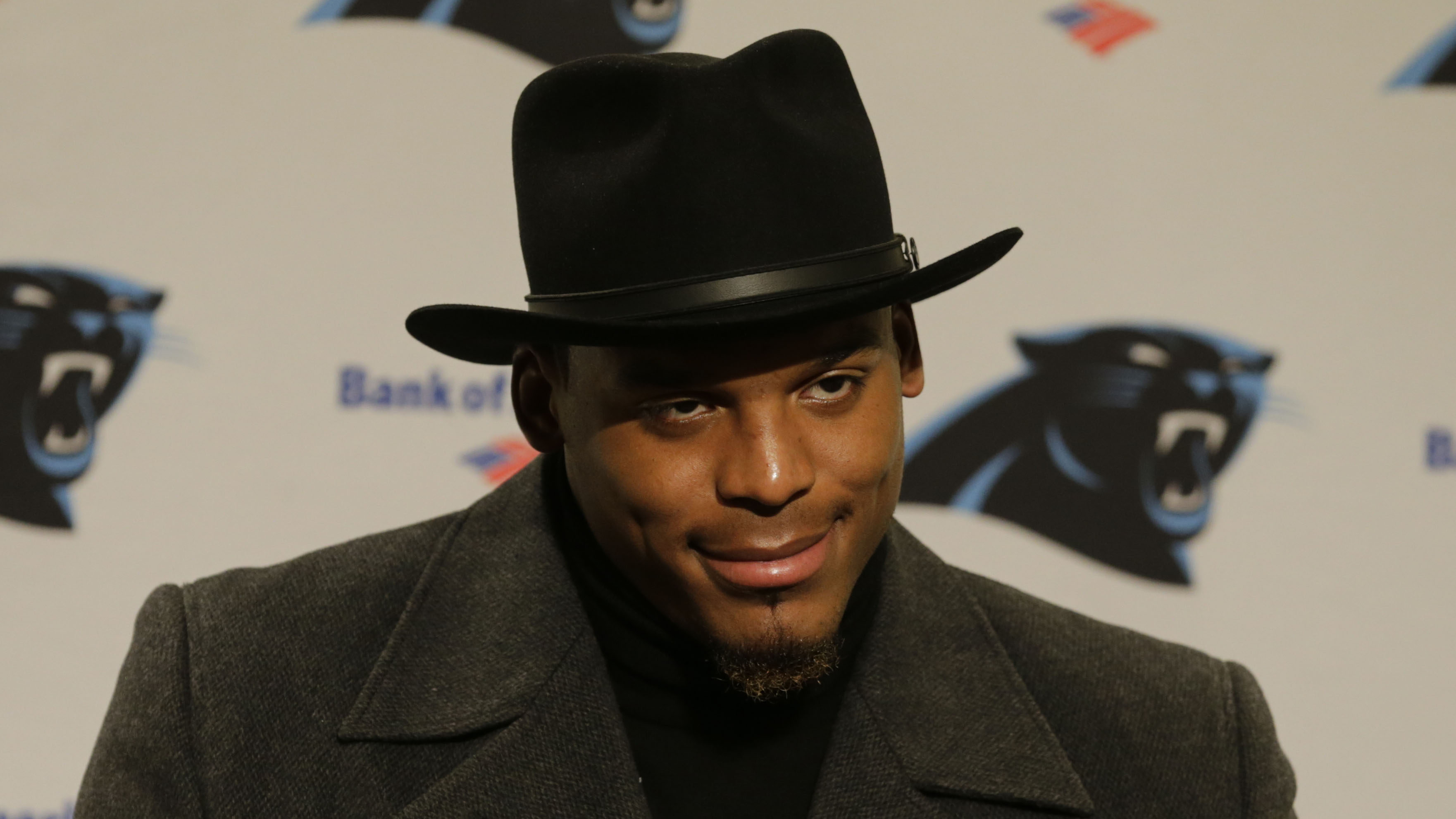 NFL Quarterback Cam Newton Spotted Wearing 'Wildest' Business Class Attire  Ever